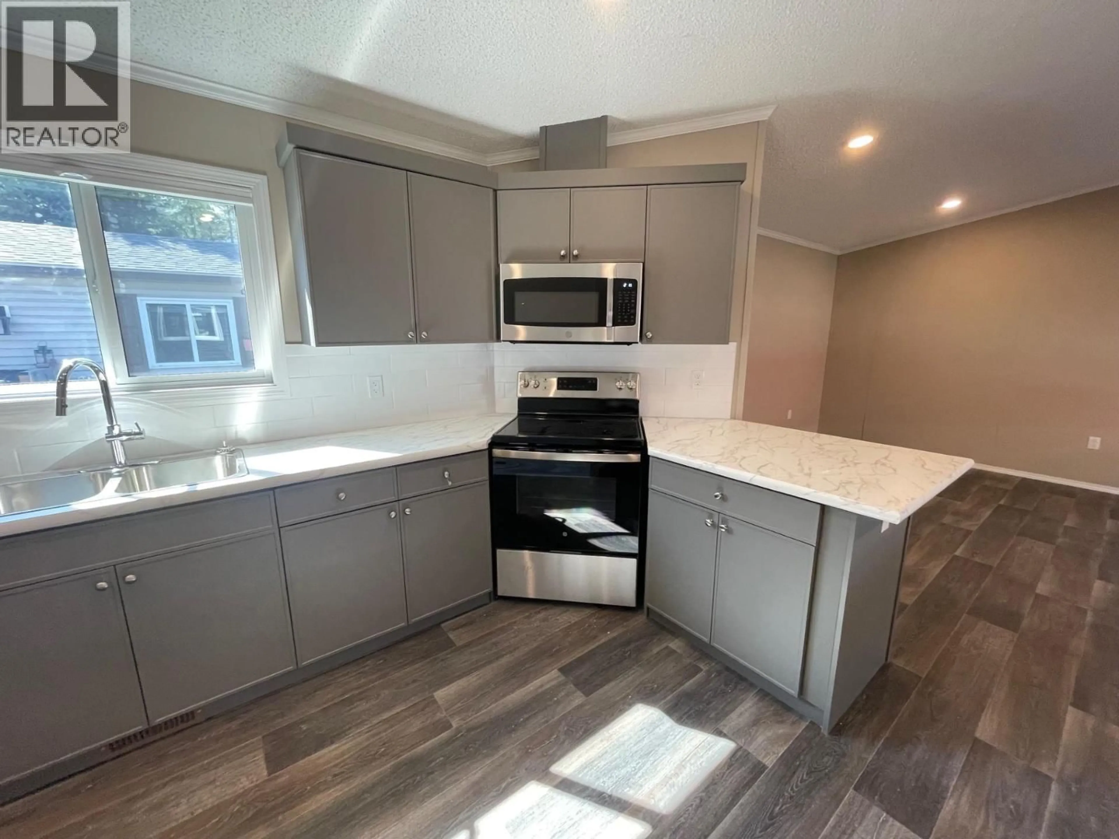 Open concept kitchen, unknown for 63 - 100 ASPEN DRIVE, Sparwood British Columbia V0B2G0