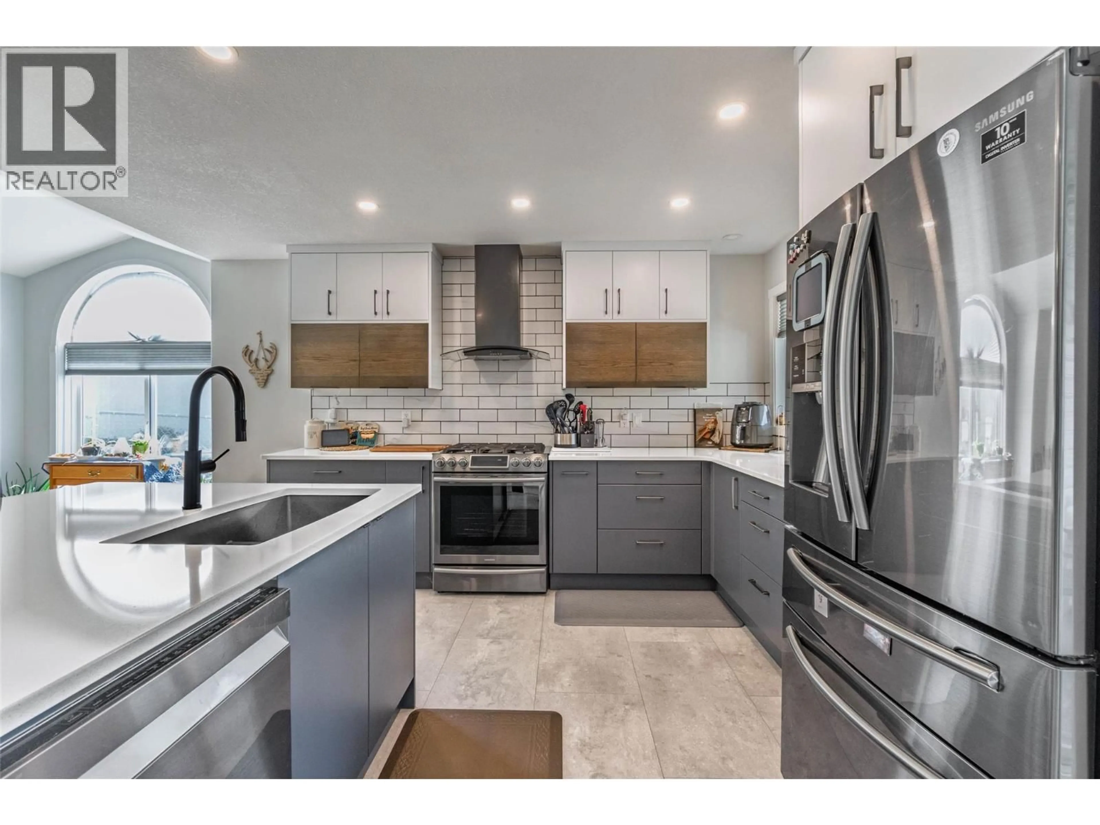 Contemporary kitchen, ceramic/tile floor for 323 RIESLING PLACE, Oliver British Columbia V0H1T4