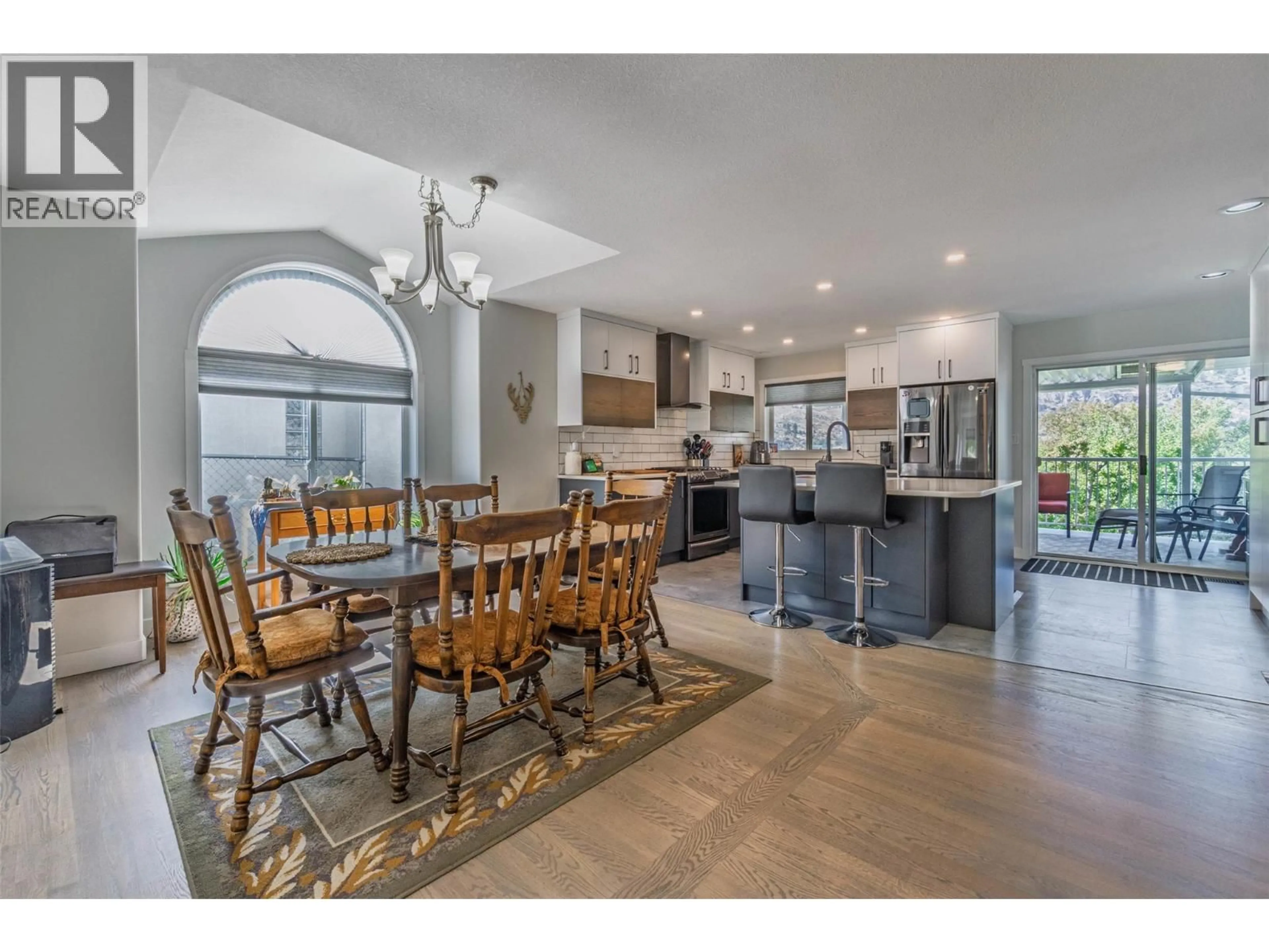 Open concept kitchen, ceramic/tile floor for 323 RIESLING PLACE, Oliver British Columbia V0H1T4