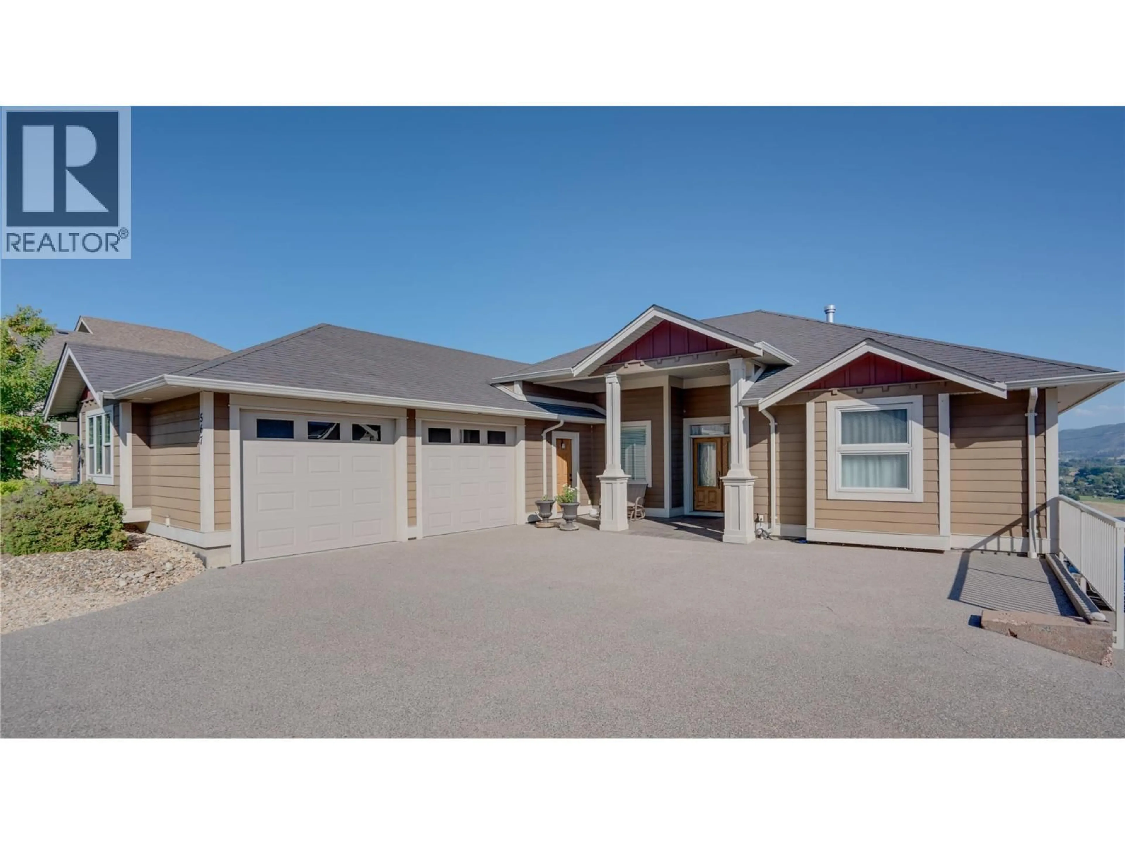 Home with vinyl exterior material, street for 567 MT IDA DRIVE, Coldstream British Columbia V1B4A8