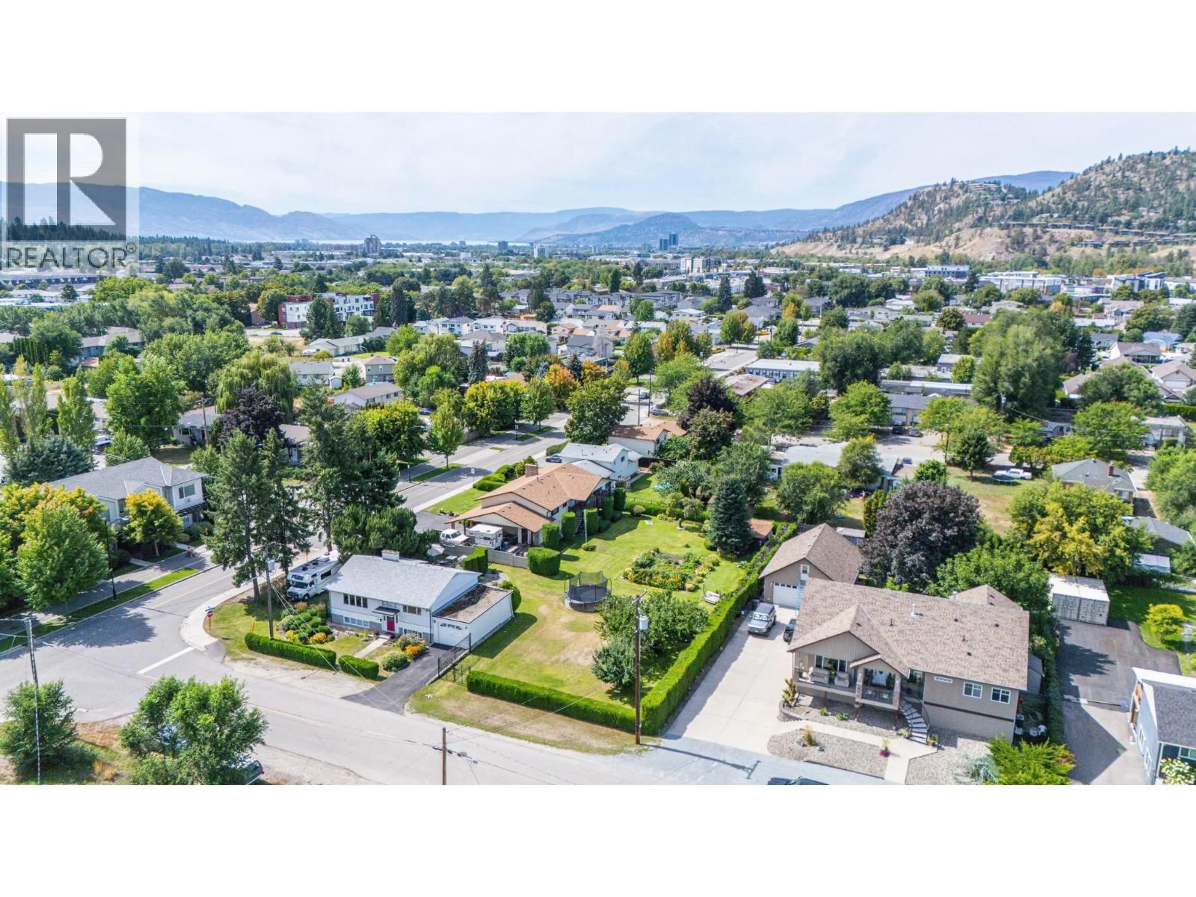 A pic from outside/outdoor area/front of a property/back of a property/a pic from drone, mountain view for 350 FLEMING ROAD, Kelowna British Columbia V1X3Z3