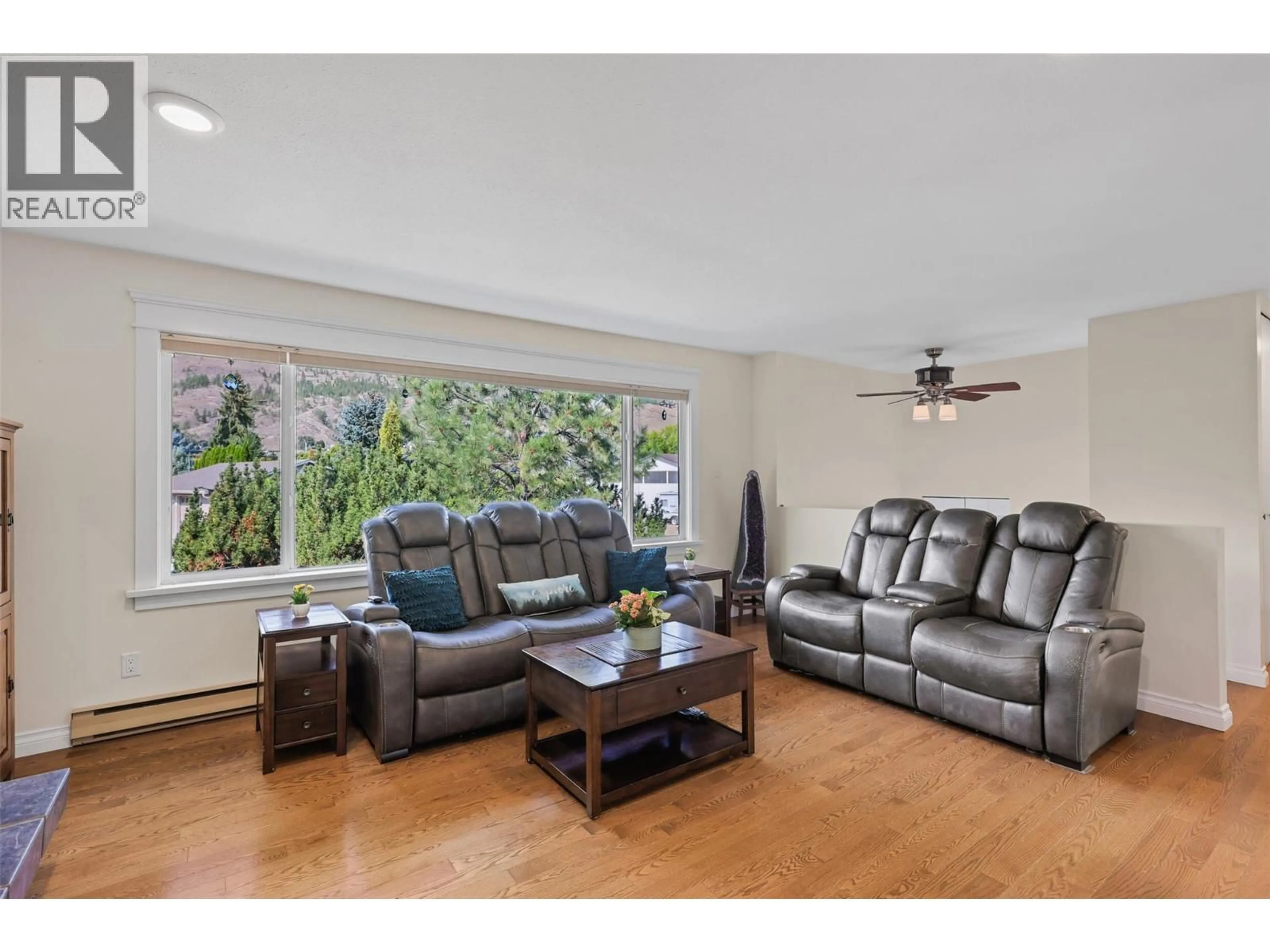 Living room with furniture, wood/laminate floor for 3507 BANK ROAD, Kamloops British Columbia V2B7A3
