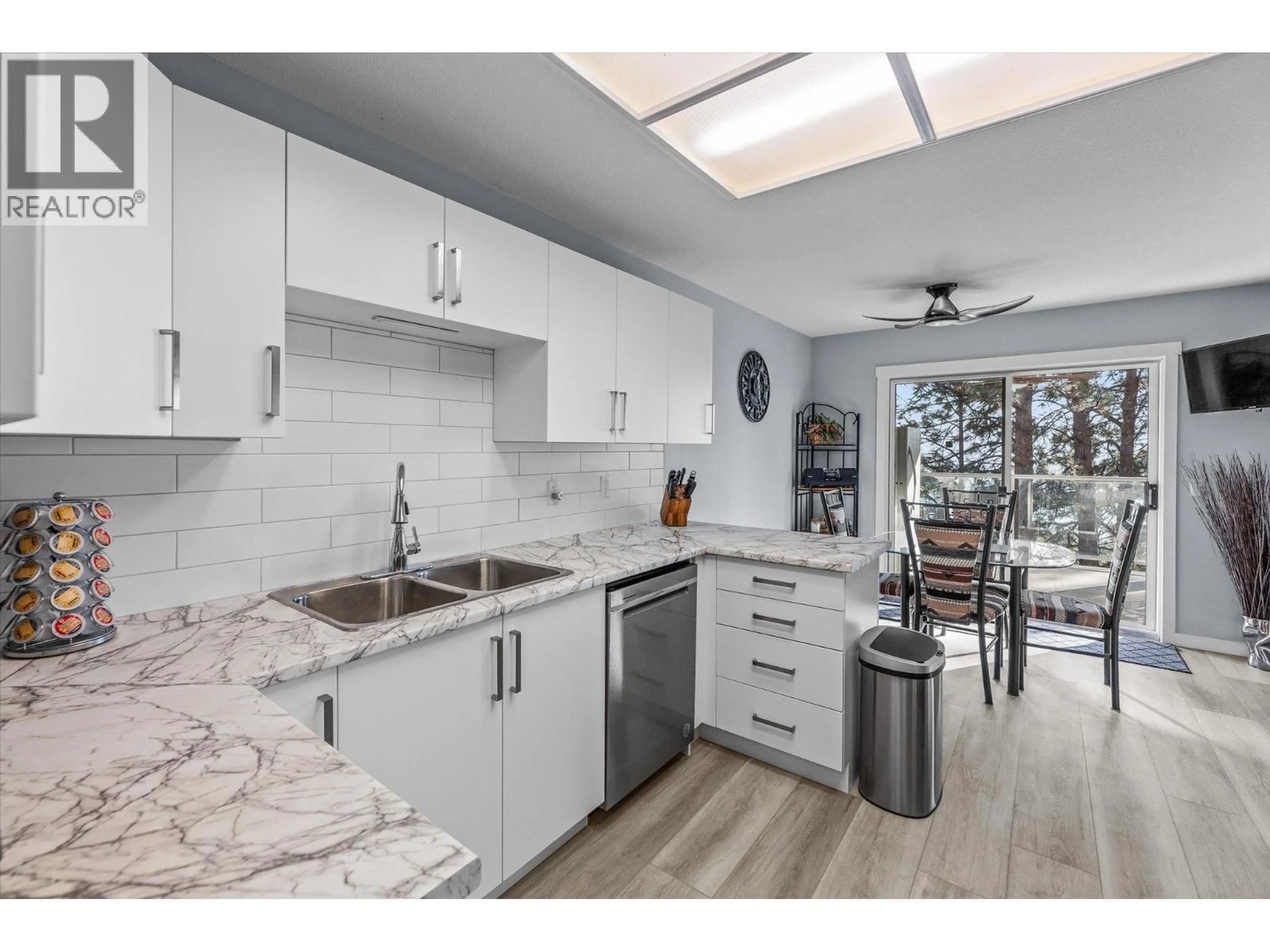 Open concept kitchen, ceramic/tile floor for 114 - 4630 PONDEROSA DRIVE, Peachland British Columbia V0H1X5