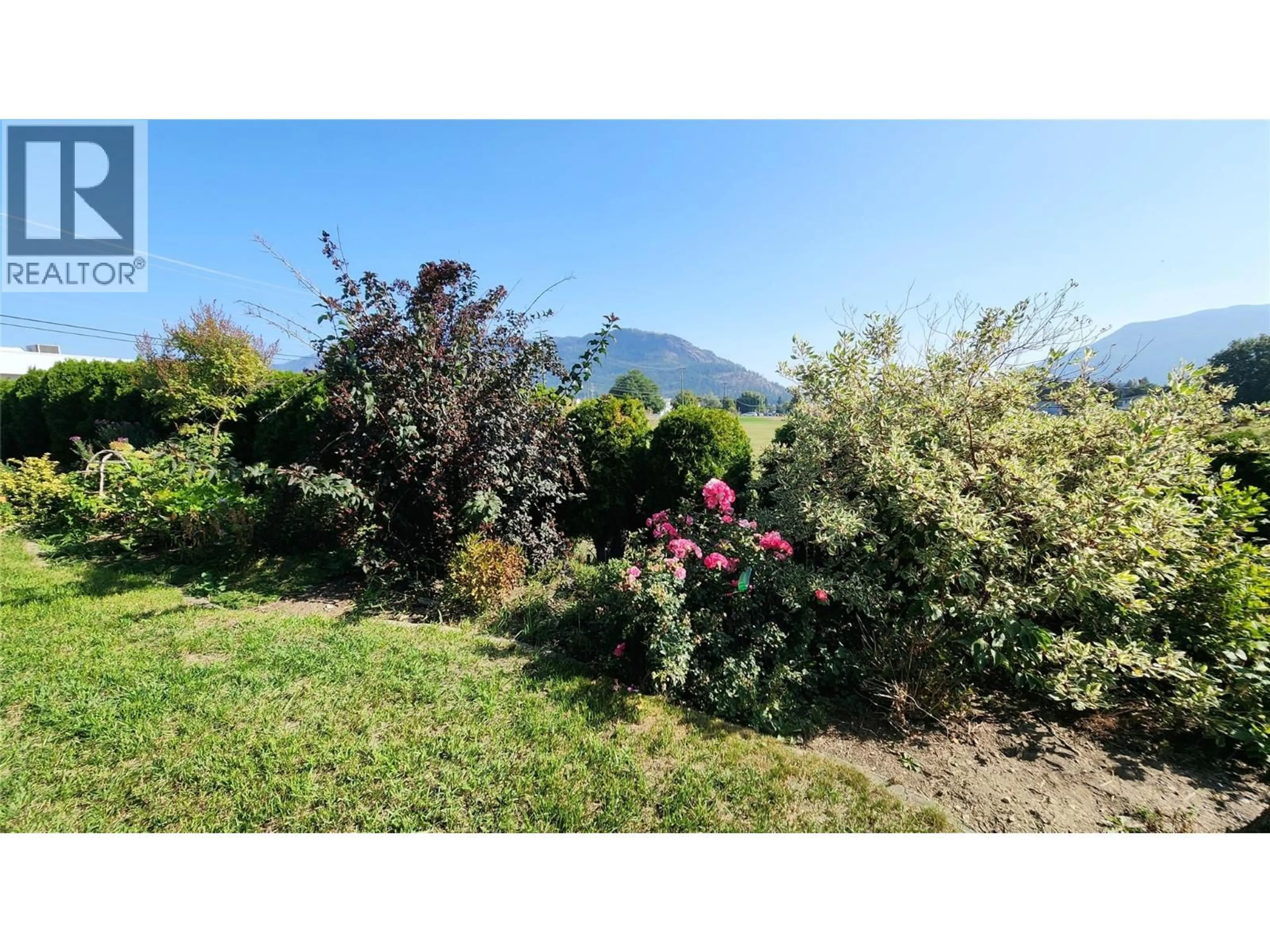 A pic from outside/outdoor area/front of a property/back of a property/a pic from drone, mountain view for 700 BASS AVENUE, Enderby British Columbia V0E1V2