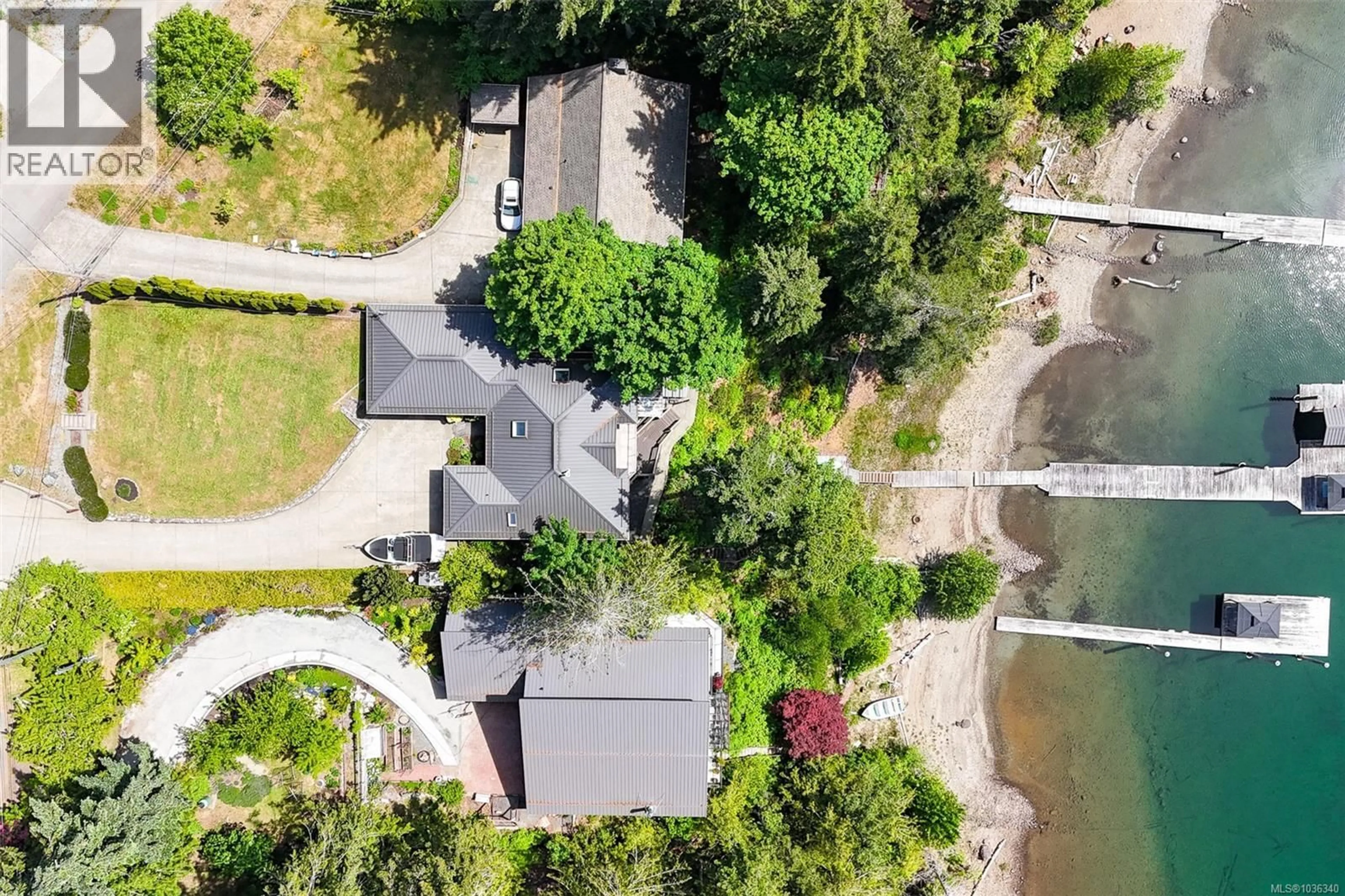 A pic from outside/outdoor area/front of a property/back of a property/a pic from drone, water/lake/river/ocean view for 10172 BISHOP DRIVE, Port Alberni British Columbia V9Y9A6