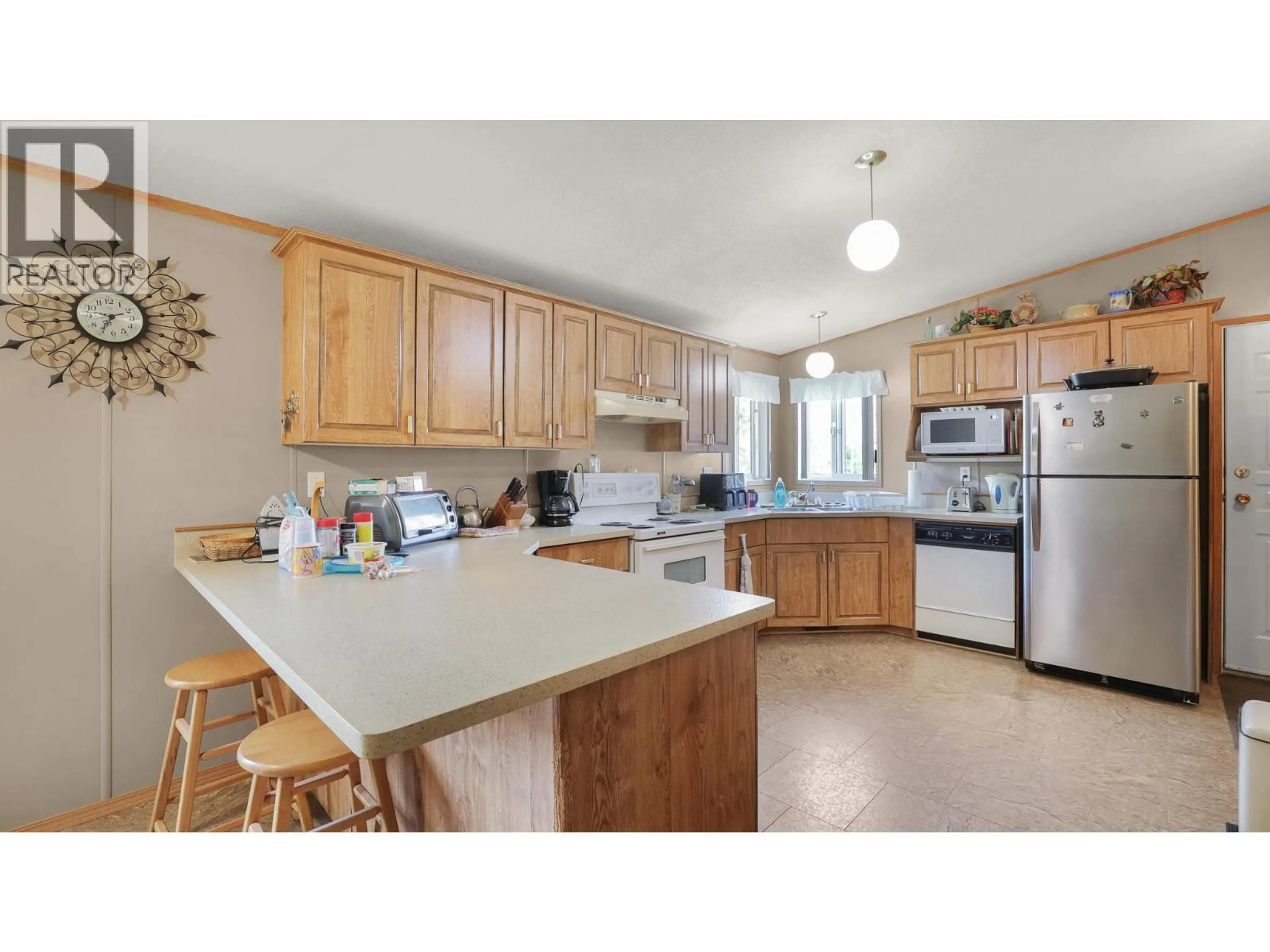 Open concept kitchen, unknown for 9196 WEST AVENUE, Wilmer British Columbia V0A1K5