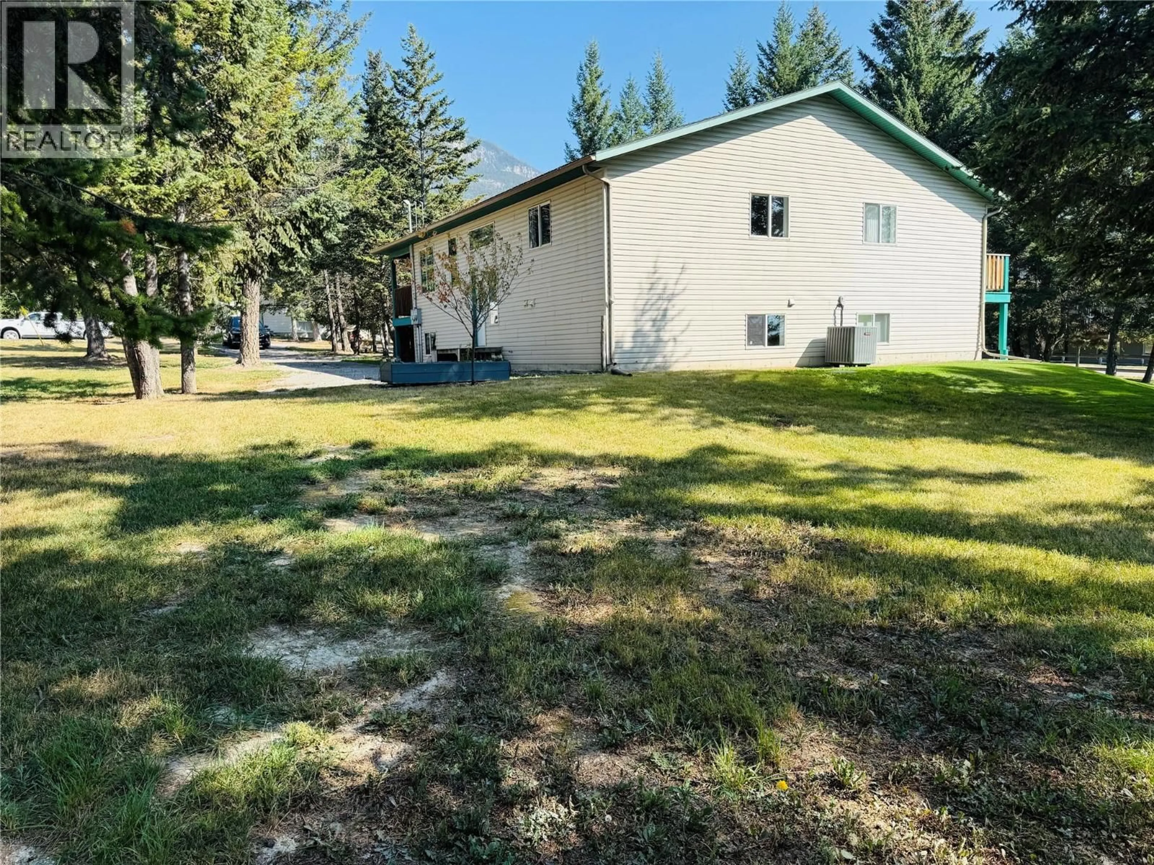 A pic from outside/outdoor area/front of a property/back of a property/a pic from drone, unknown for 1B WOLF CRESCENT, Windermere British Columbia V0A1K2