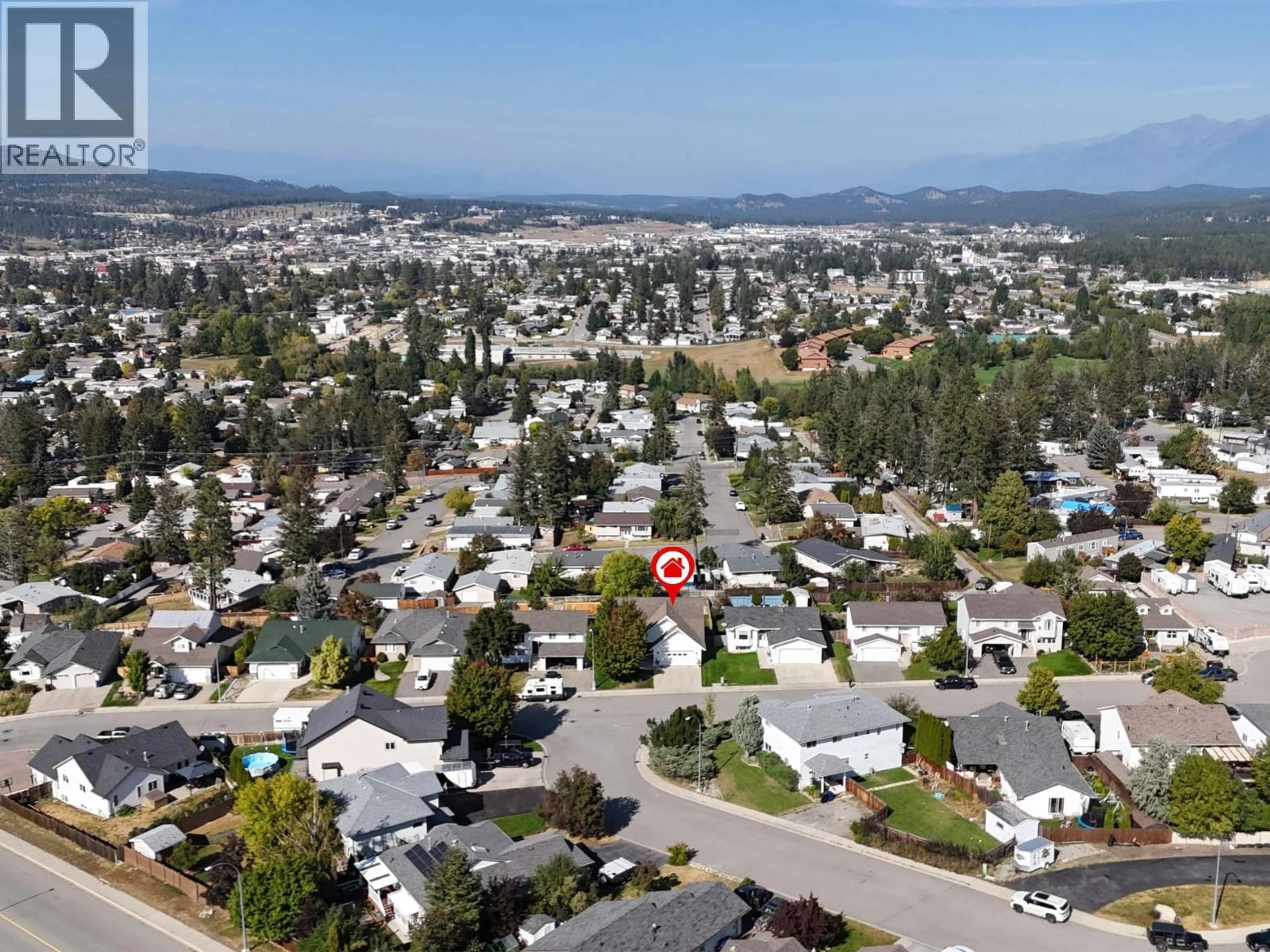 A pic from outside/outdoor area/front of a property/back of a property/a pic from drone, mountain view for 1908 12TH STREET SOUTH, Cranbrook British Columbia V1C6M7