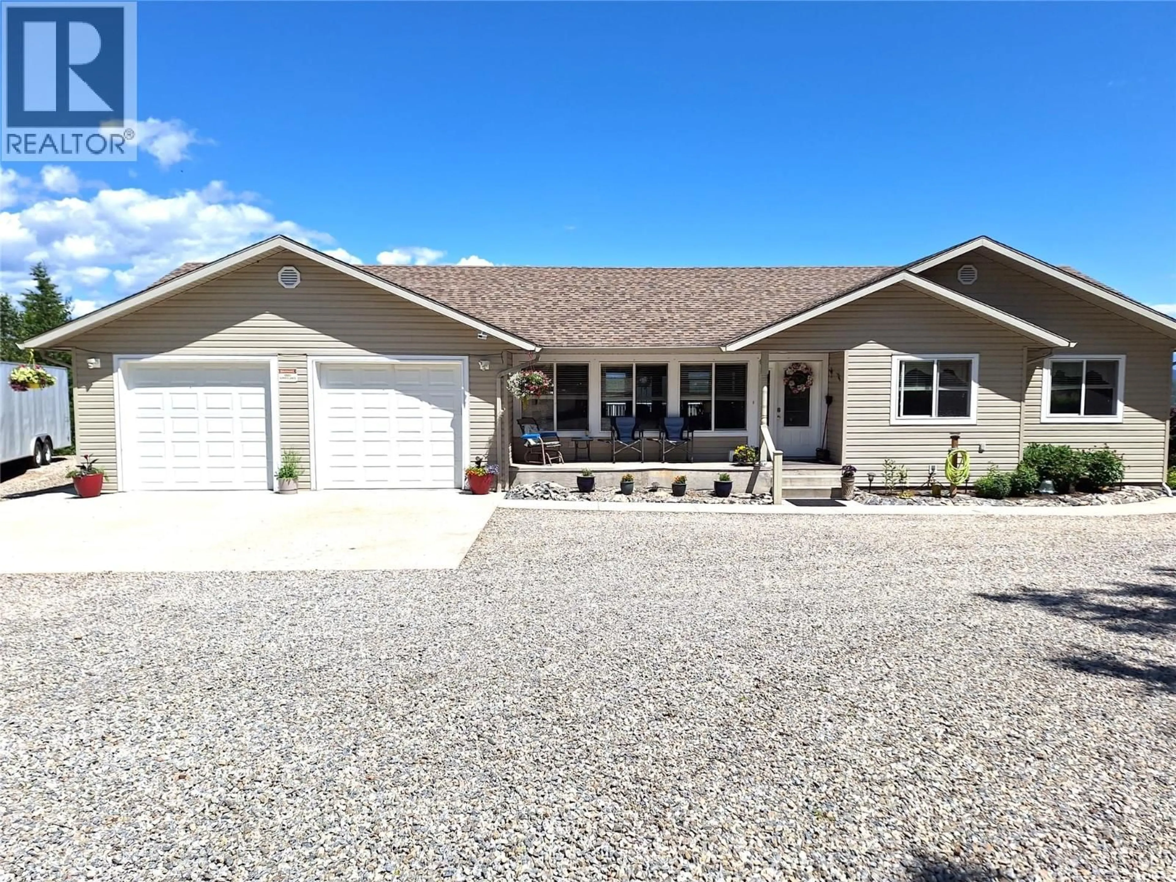 Home with vinyl exterior material, street for 1406 HUCKLEBERRY DRIVE, Sorrento British Columbia V0E2W1