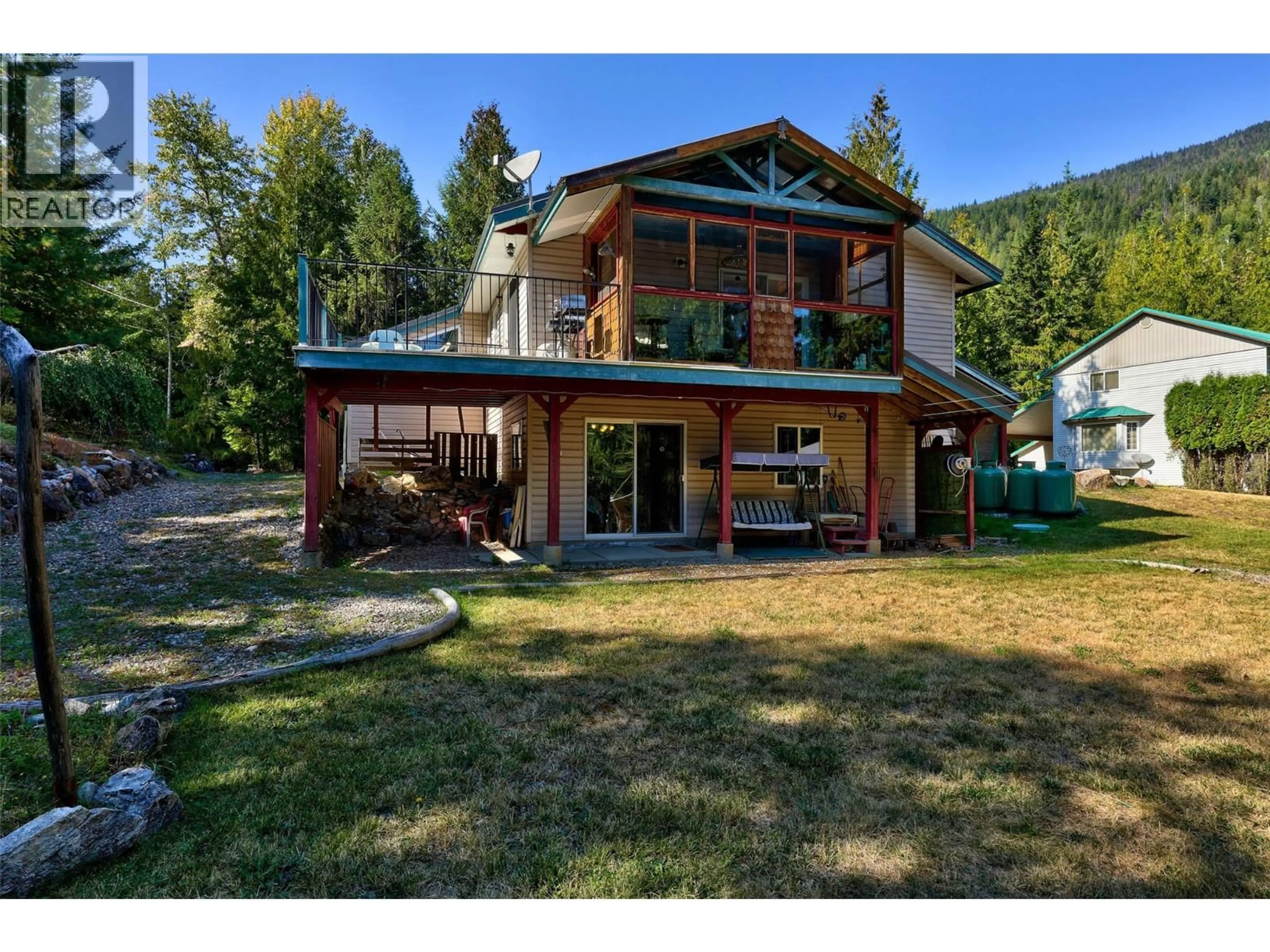 A pic from outside/outdoor area/front of a property/back of a property/a pic from drone, unknown for 7650 MOUNTAIN DRIVE, Anglemont British Columbia V0E1M8