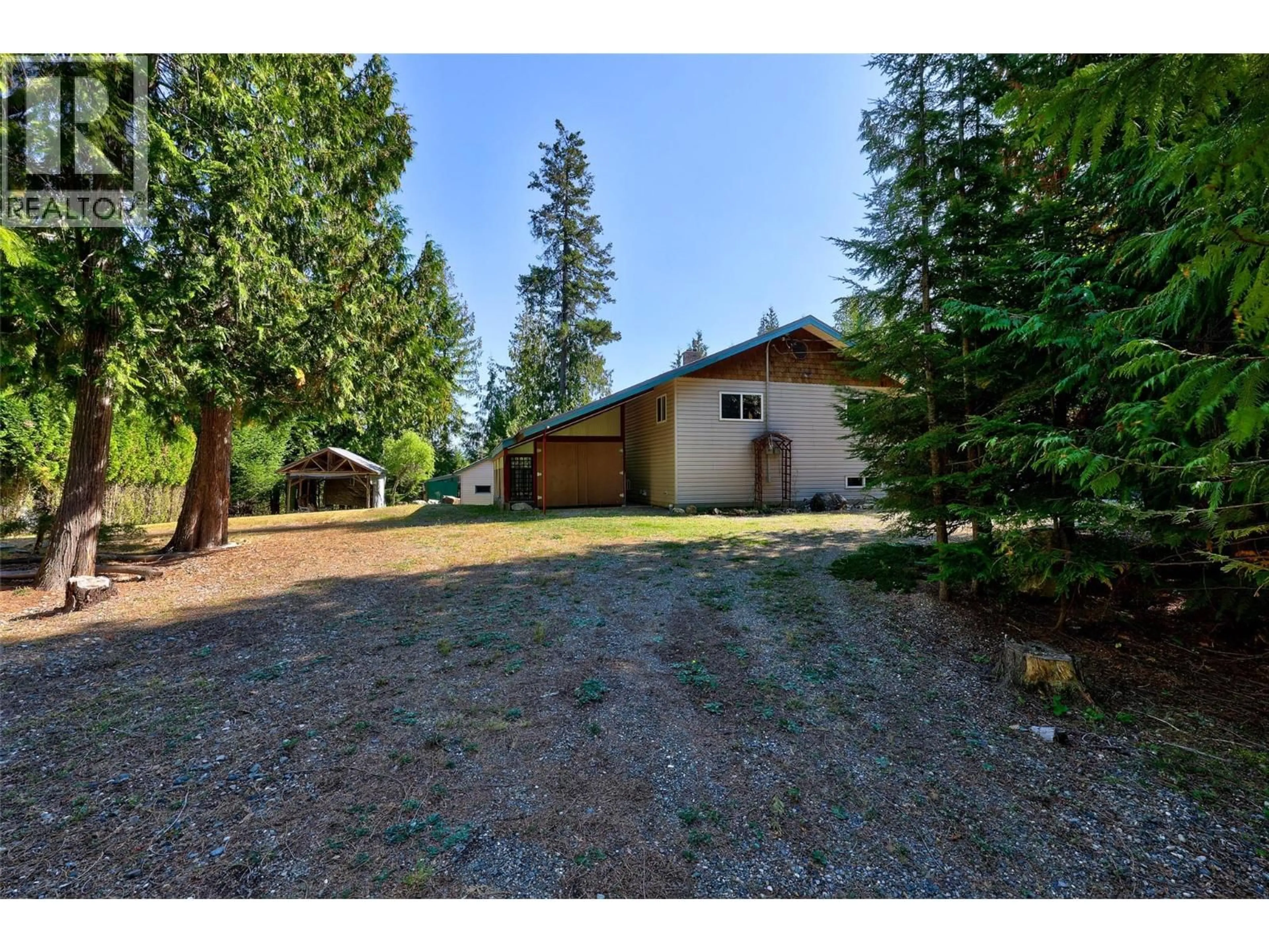 A pic from outside/outdoor area/front of a property/back of a property/a pic from drone, unknown for 7650 MOUNTAIN DRIVE, Anglemont British Columbia V0E1M8