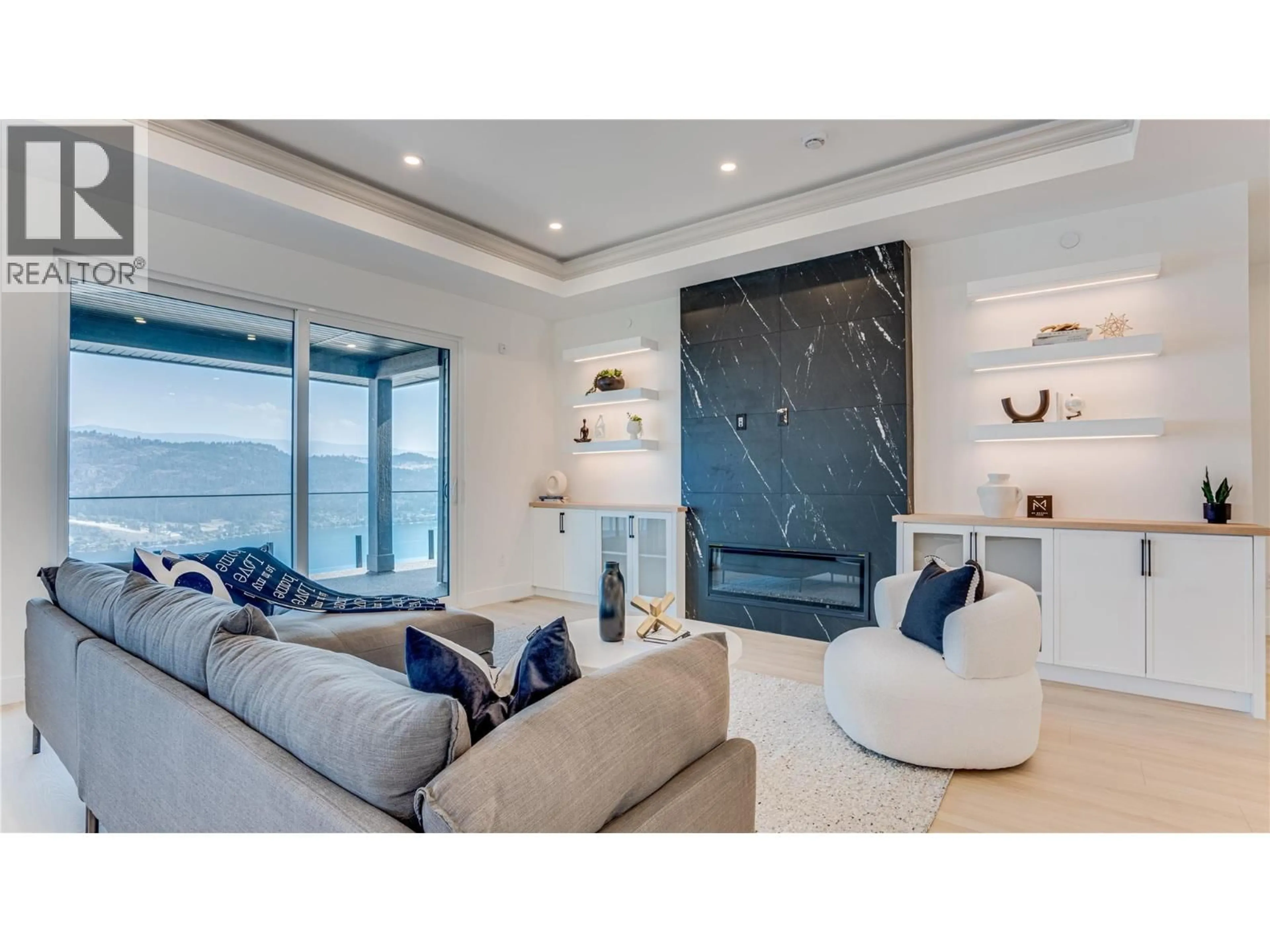 Living room with furniture, unknown for 8912 TAVISTOCK ROAD, Vernon British Columbia V1H2L4