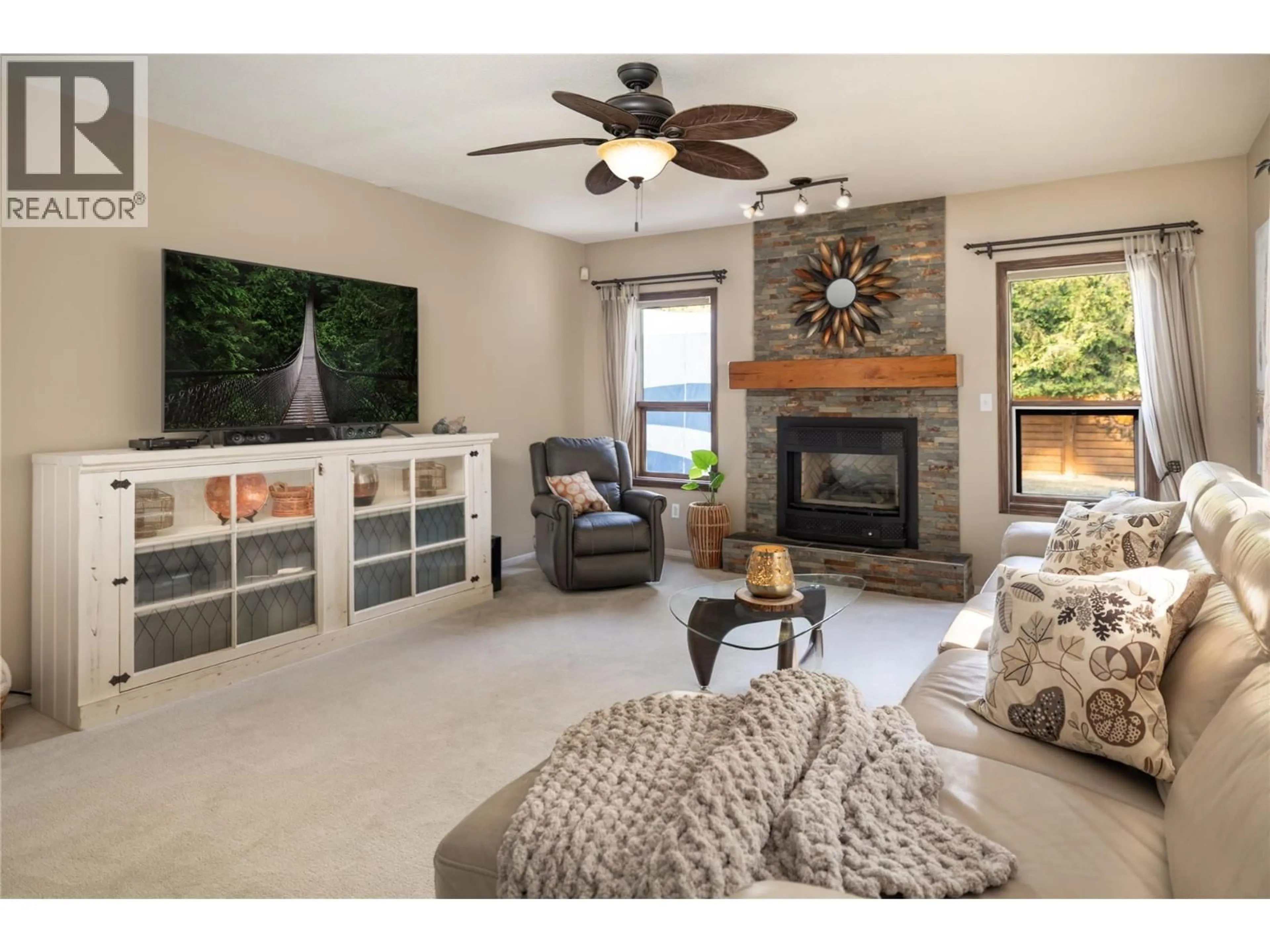 Living room with furniture, unknown for 4692 GORDON DRIVE, Kelowna British Columbia V1W4P4