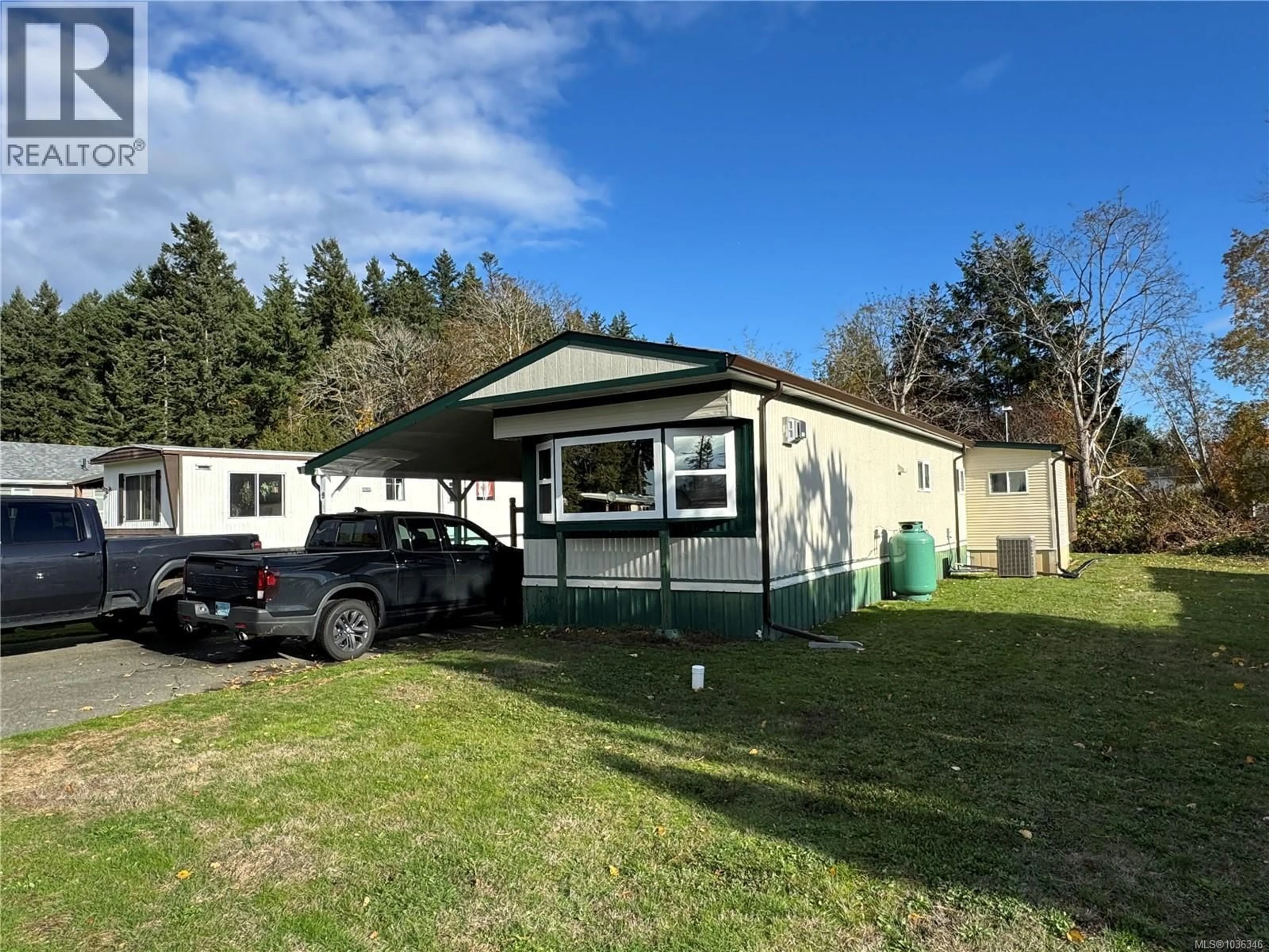 A pic from outside/outdoor area/front of a property/back of a property/a pic from drone, unknown for 9 - 3216 BACK ROAD, Comox British Columbia V9M4E2