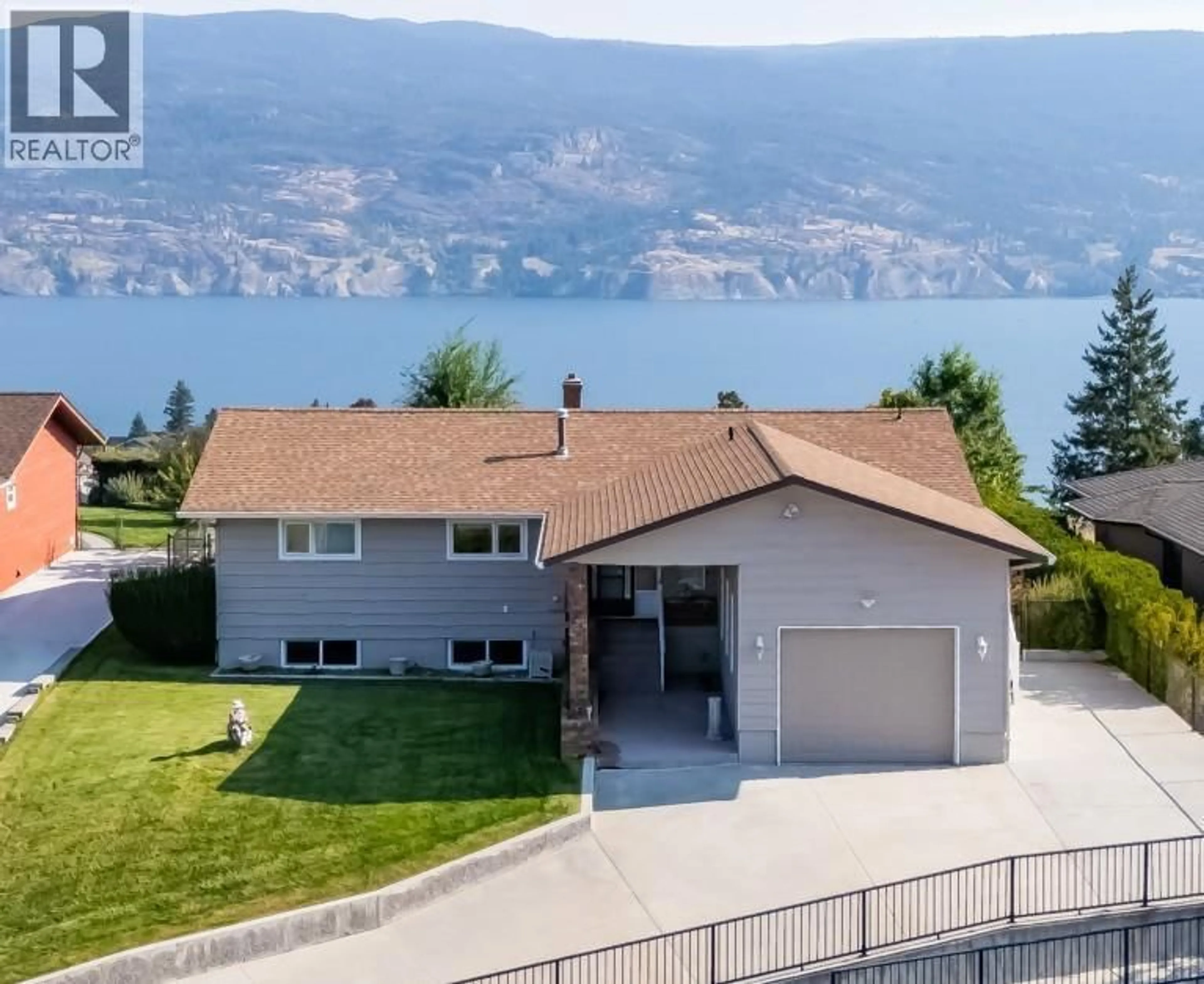 A pic from outside/outdoor area/front of a property/back of a property/a pic from drone, water/lake/river/ocean view for 13391 MCCLURE PLACE, Summerland British Columbia V0H1Z1