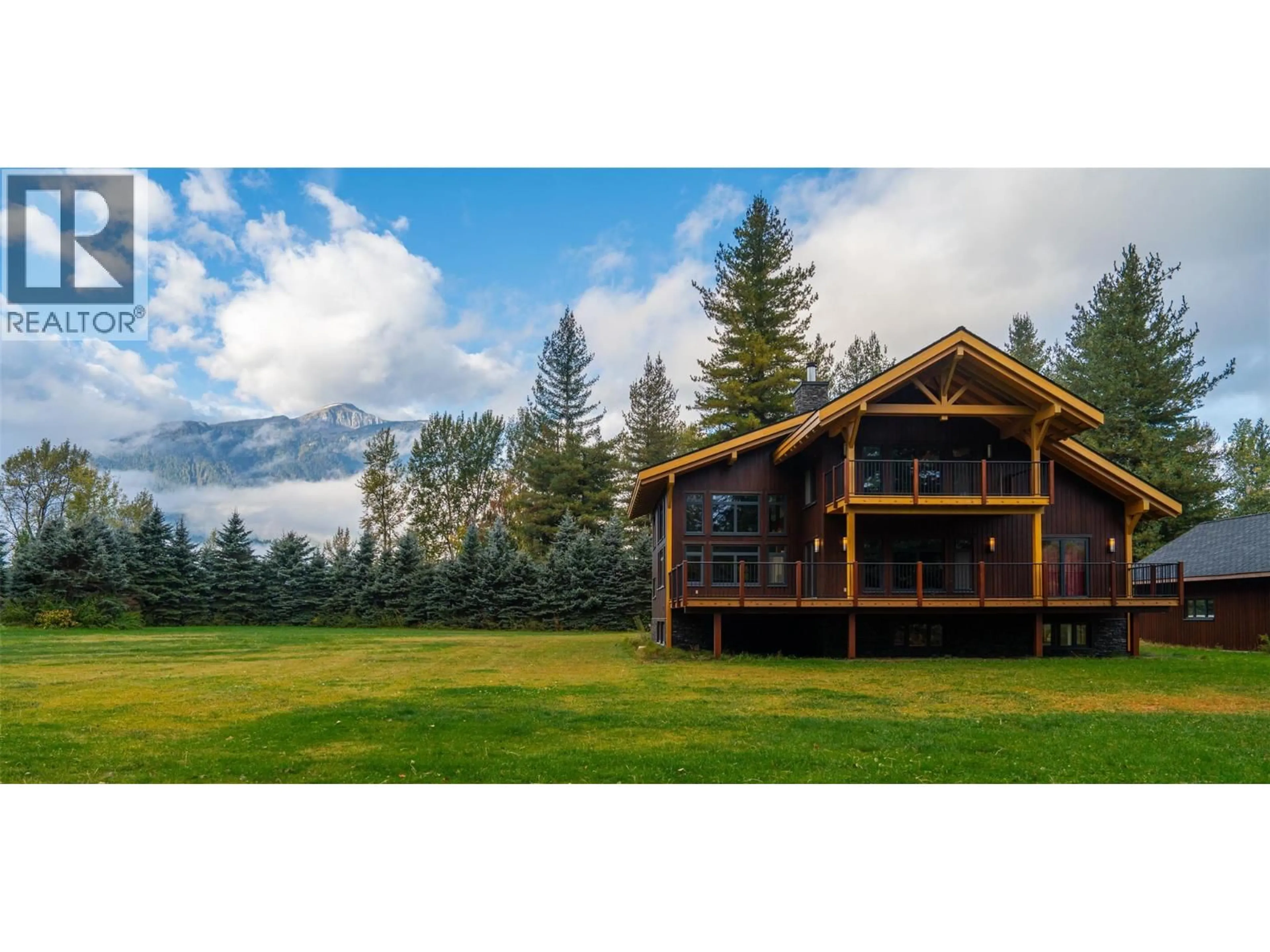 A pic from outside/outdoor area/front of a property/back of a property/a pic from drone, unknown for 3266 AIRPORT WAY, Revelstoke British Columbia V0E2S3