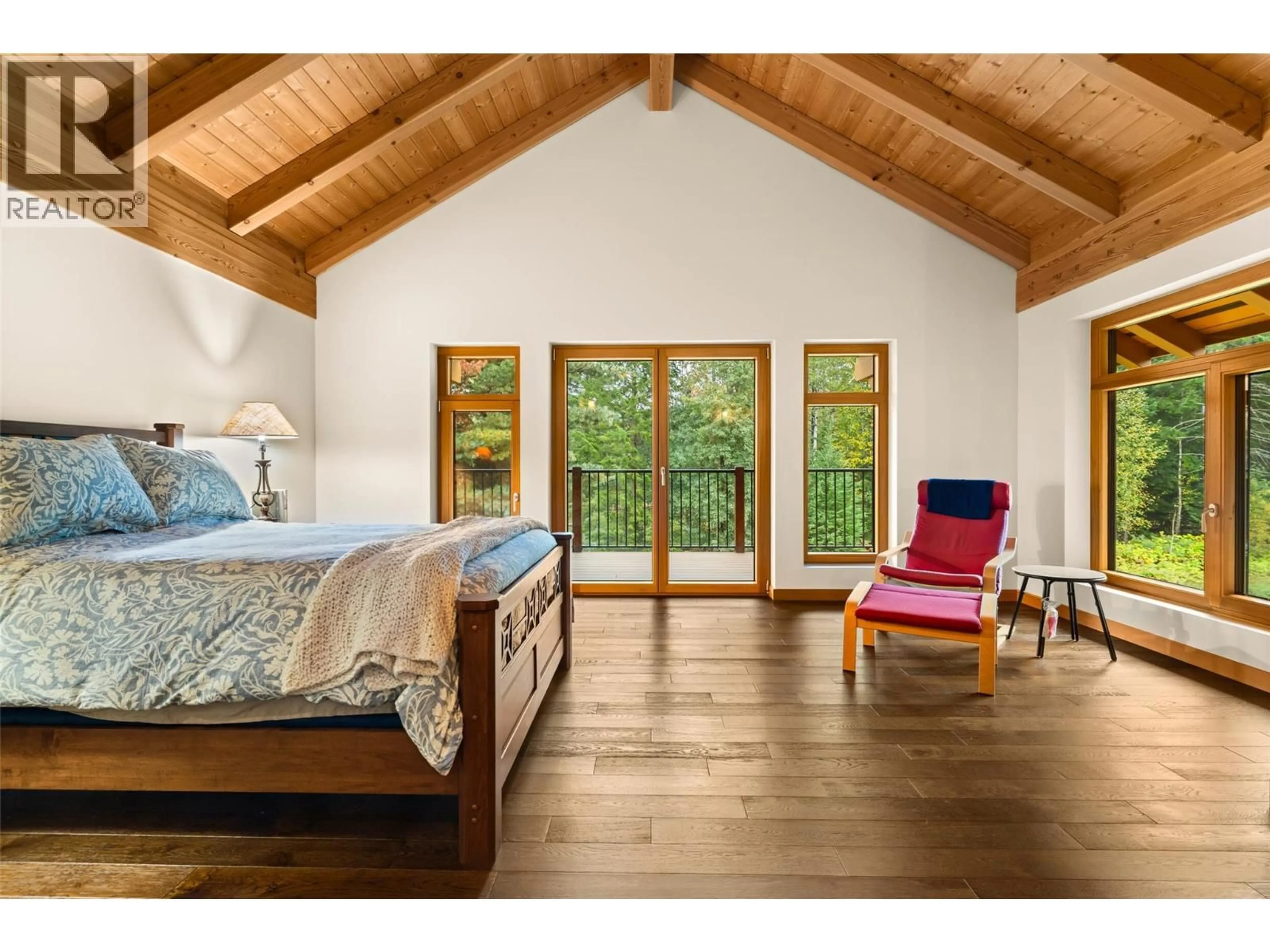 Bedroom with bed, wood/laminate floor for 3266 AIRPORT WAY, Revelstoke British Columbia V0E2S3
