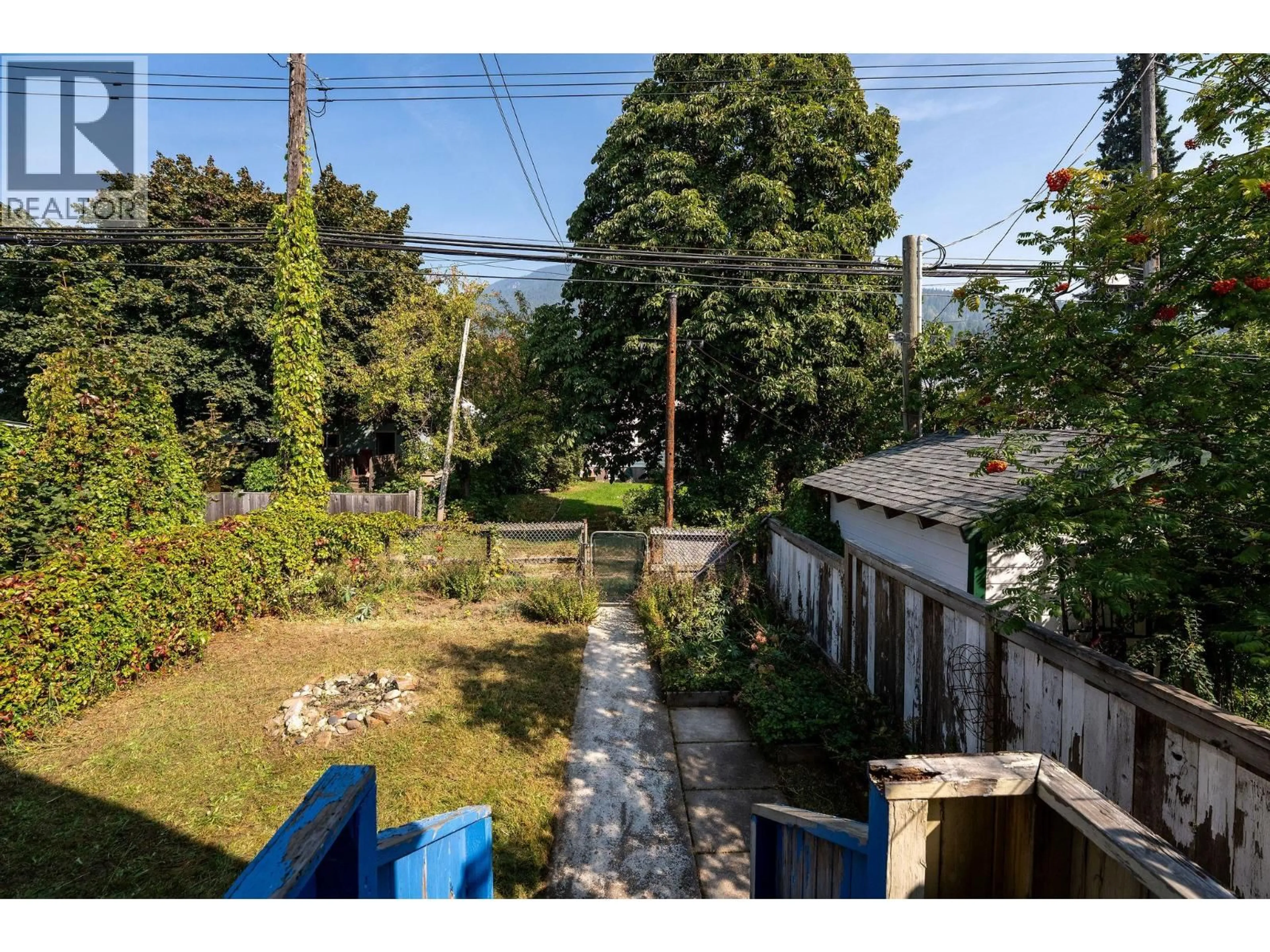 A pic from outside/outdoor area/front of a property/back of a property/a pic from drone, street for 910 SECOND STREET WEST, Revelstoke British Columbia V0E2S0