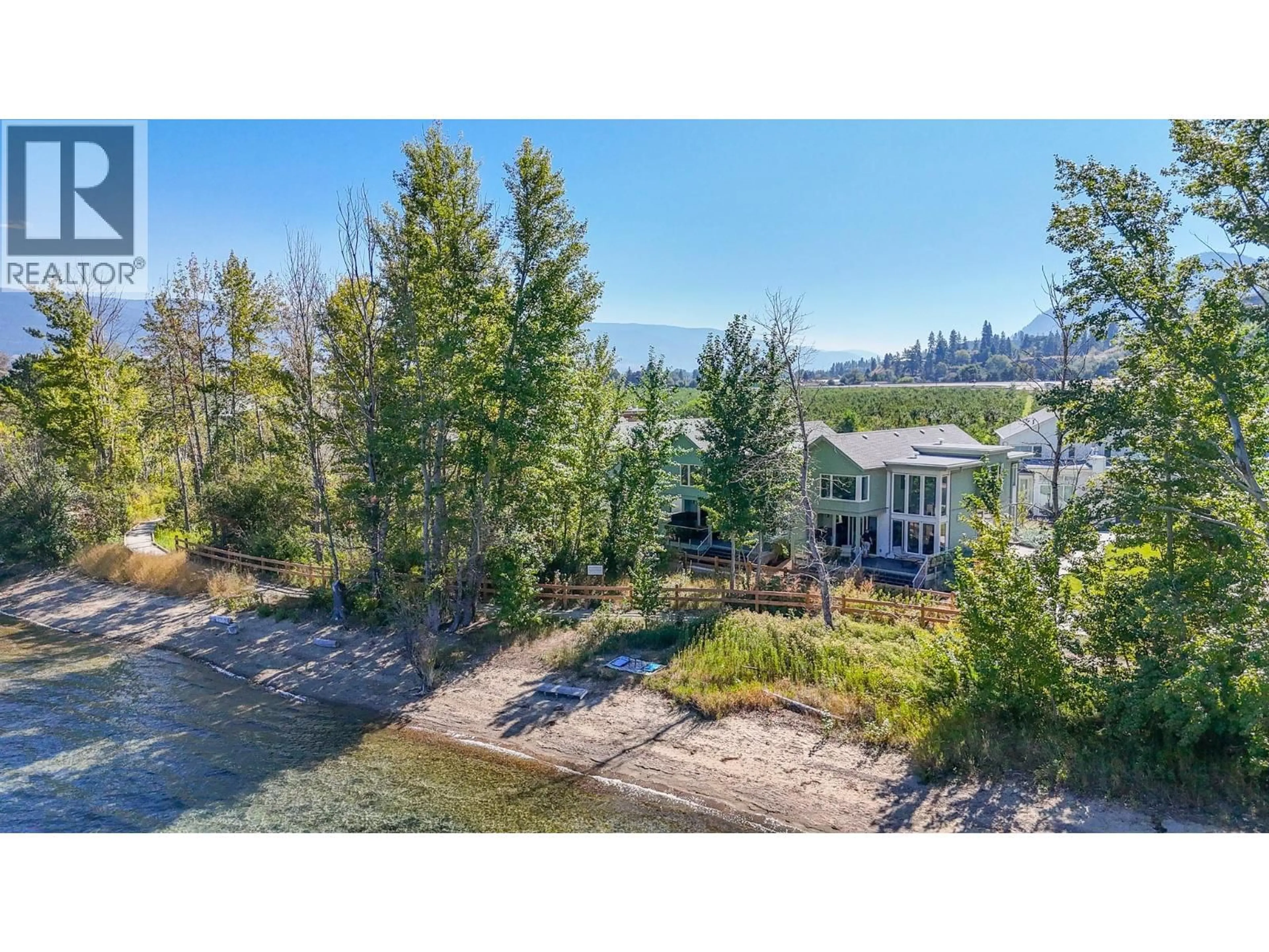 A pic from outside/outdoor area/front of a property/back of a property/a pic from drone, water/lake/river/ocean view for 3240 LANDRY CRESCENT, Summerland British Columbia V0H1Z9