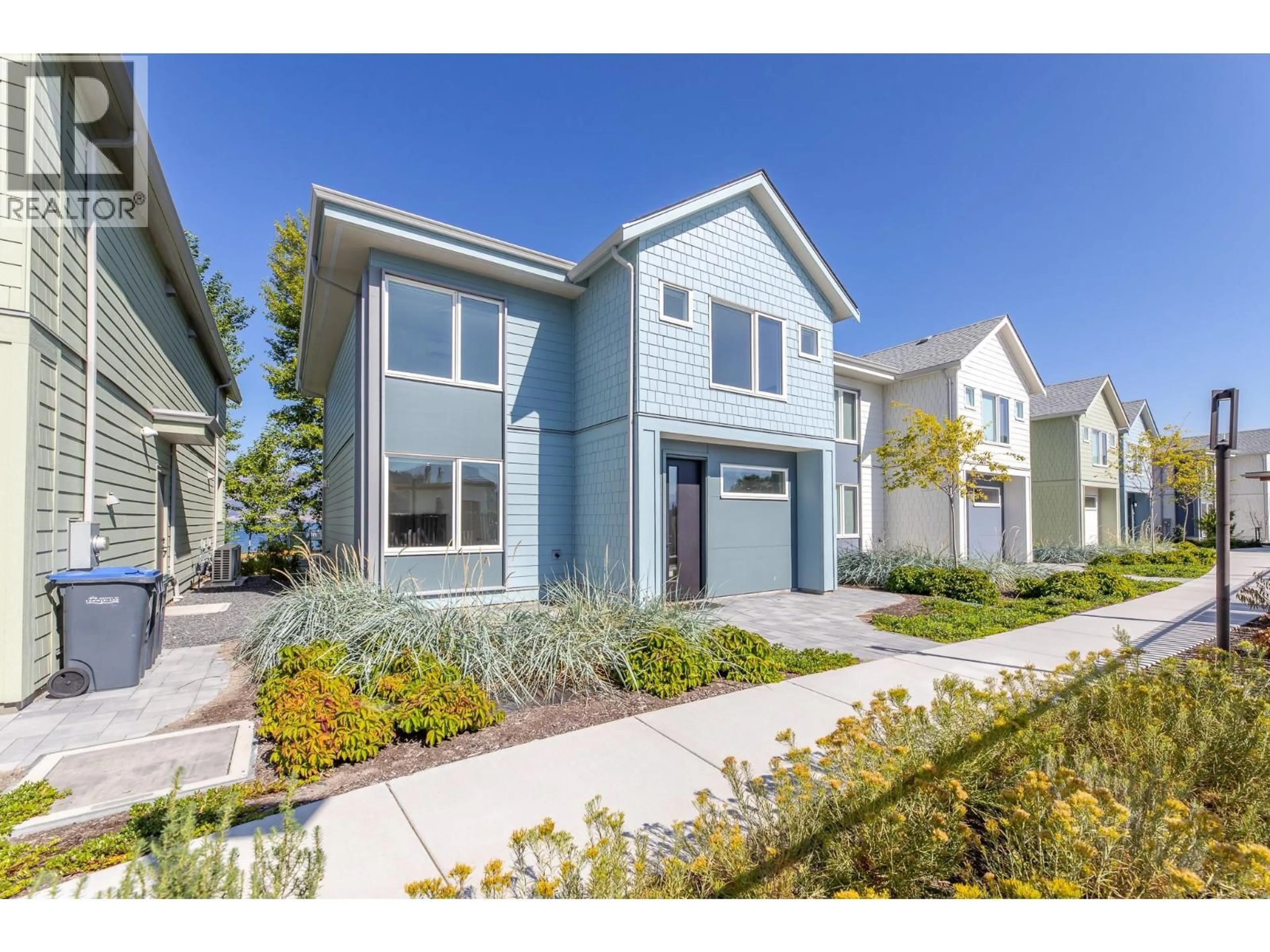 Home with vinyl exterior material, street for 3240 LANDRY CRESCENT, Summerland British Columbia V0H1Z9