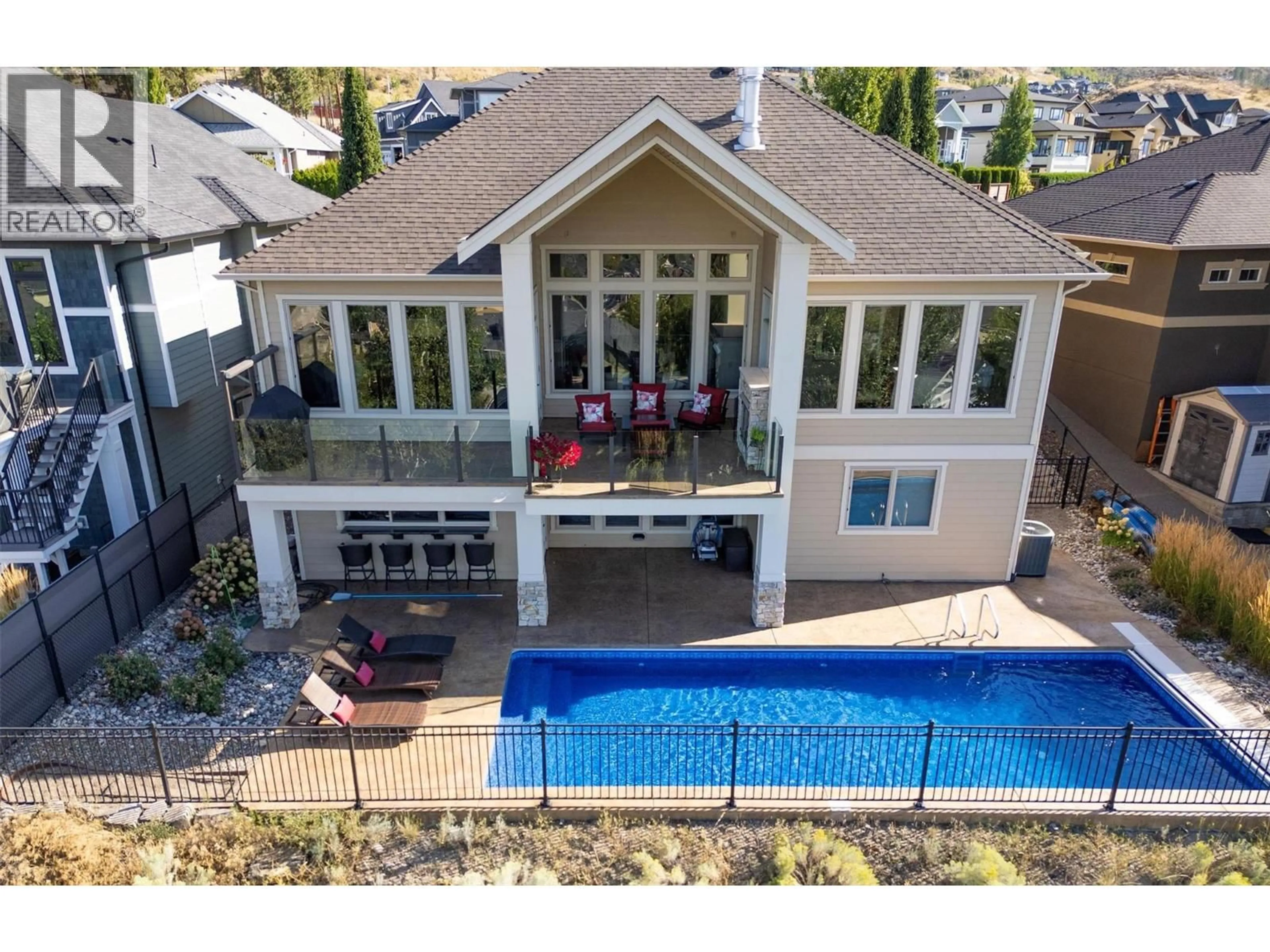 A pic from outside/outdoor area/front of a property/back of a property/a pic from drone, water/lake/river/ocean view for 440 LAKEPOINTE DRIVE, Kelowna British Columbia V1W5K2