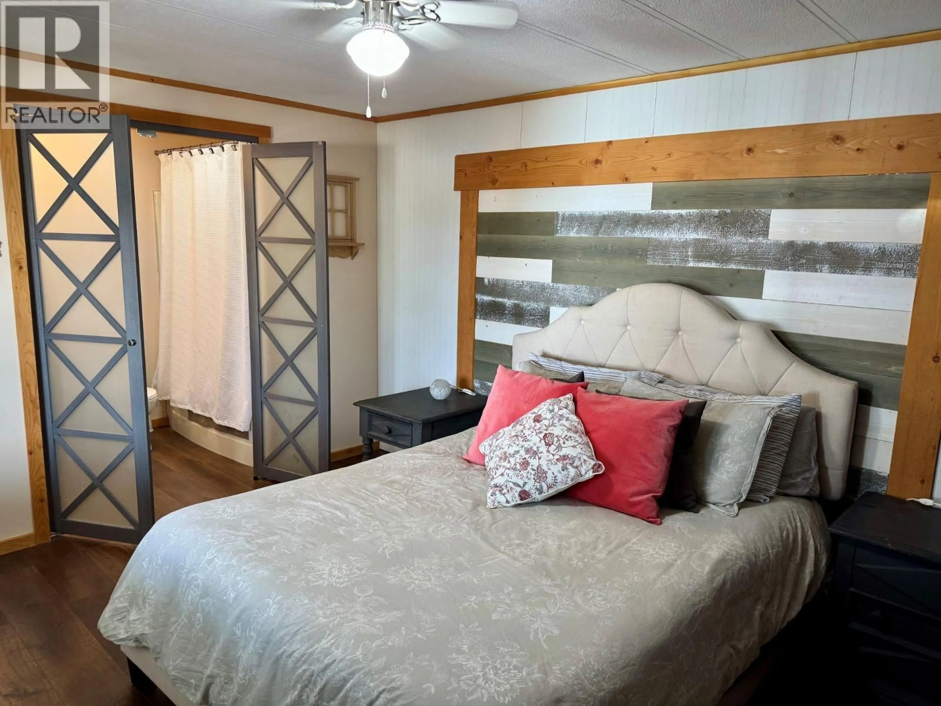 Bedroom with bed, wood/laminate floor for LAMBERT ROAD, Invermere British Columbia V0A1K2