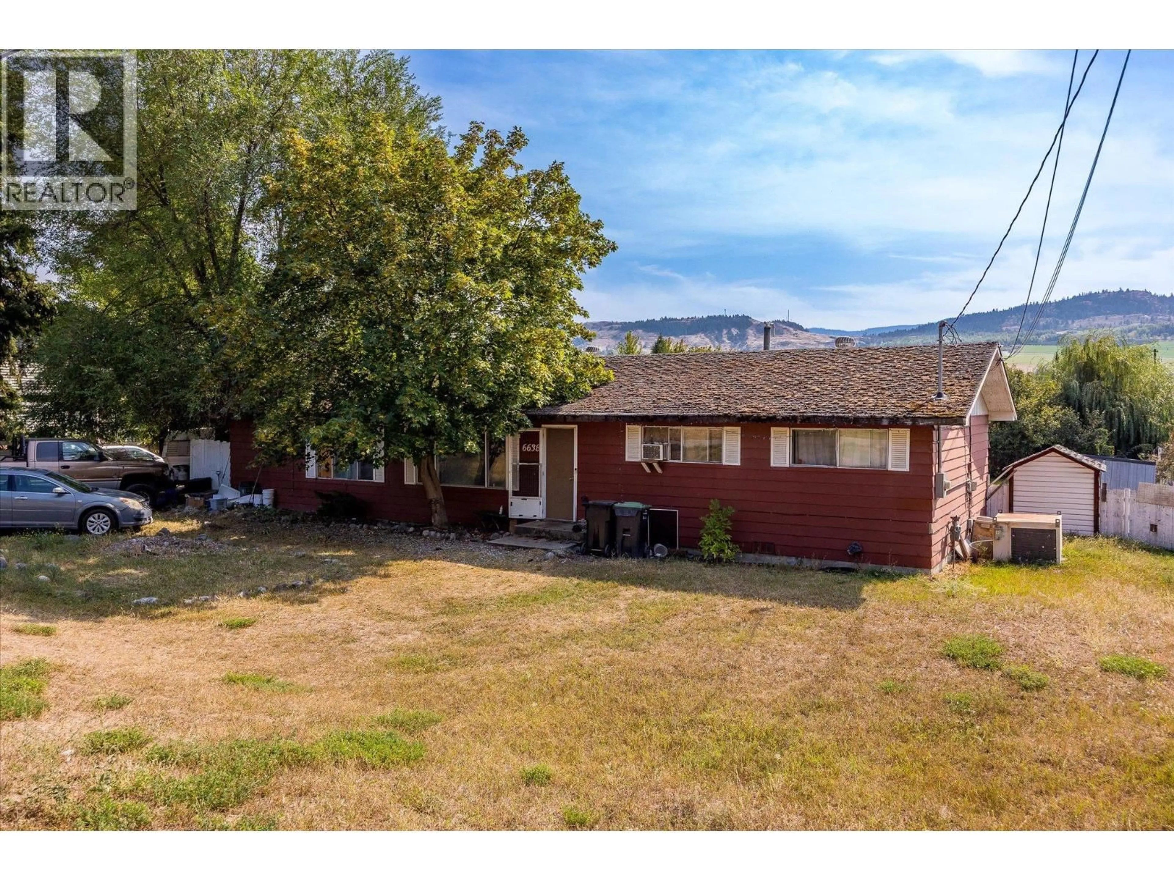 A pic from outside/outdoor area/front of a property/back of a property/a pic from drone, mountain view for 6638 SCOTT ROAD, Vernon British Columbia V1H1N3