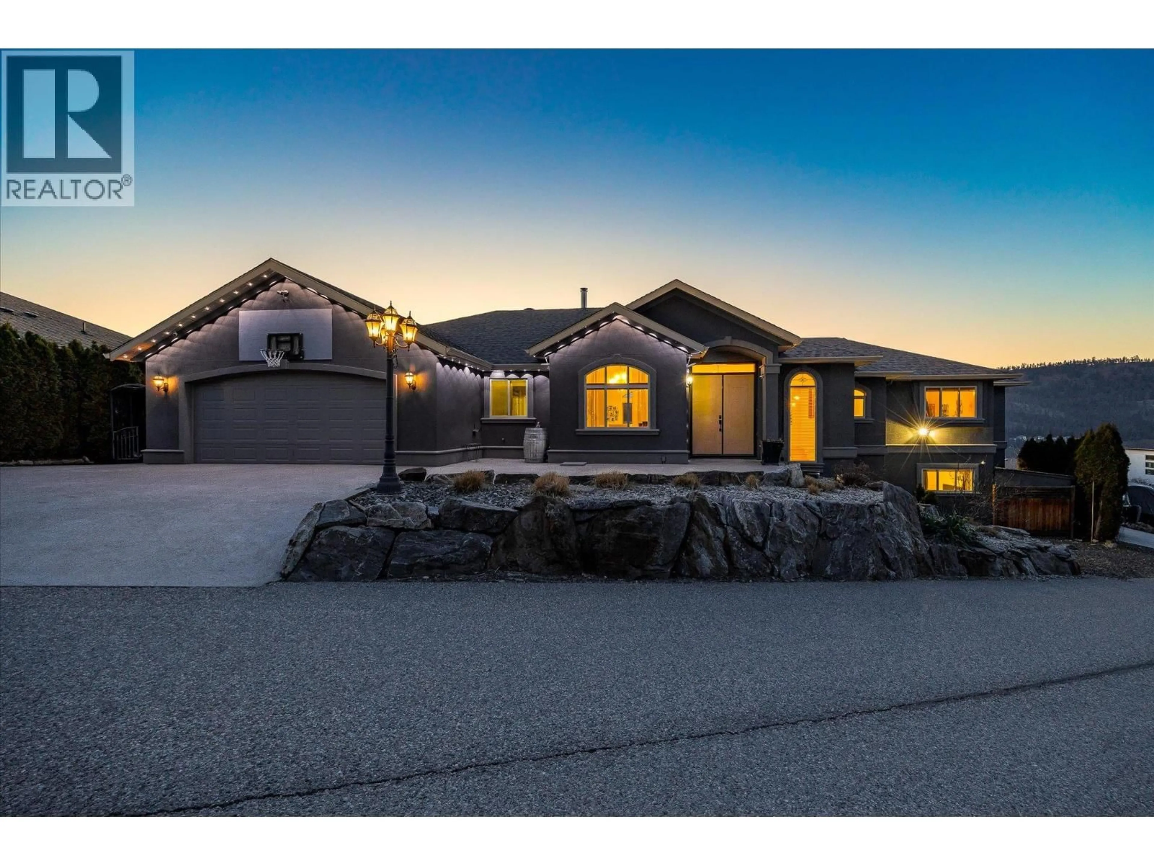 Home with brick exterior material, street for 619 DENALI COURT, Kelowna British Columbia V1V2P6