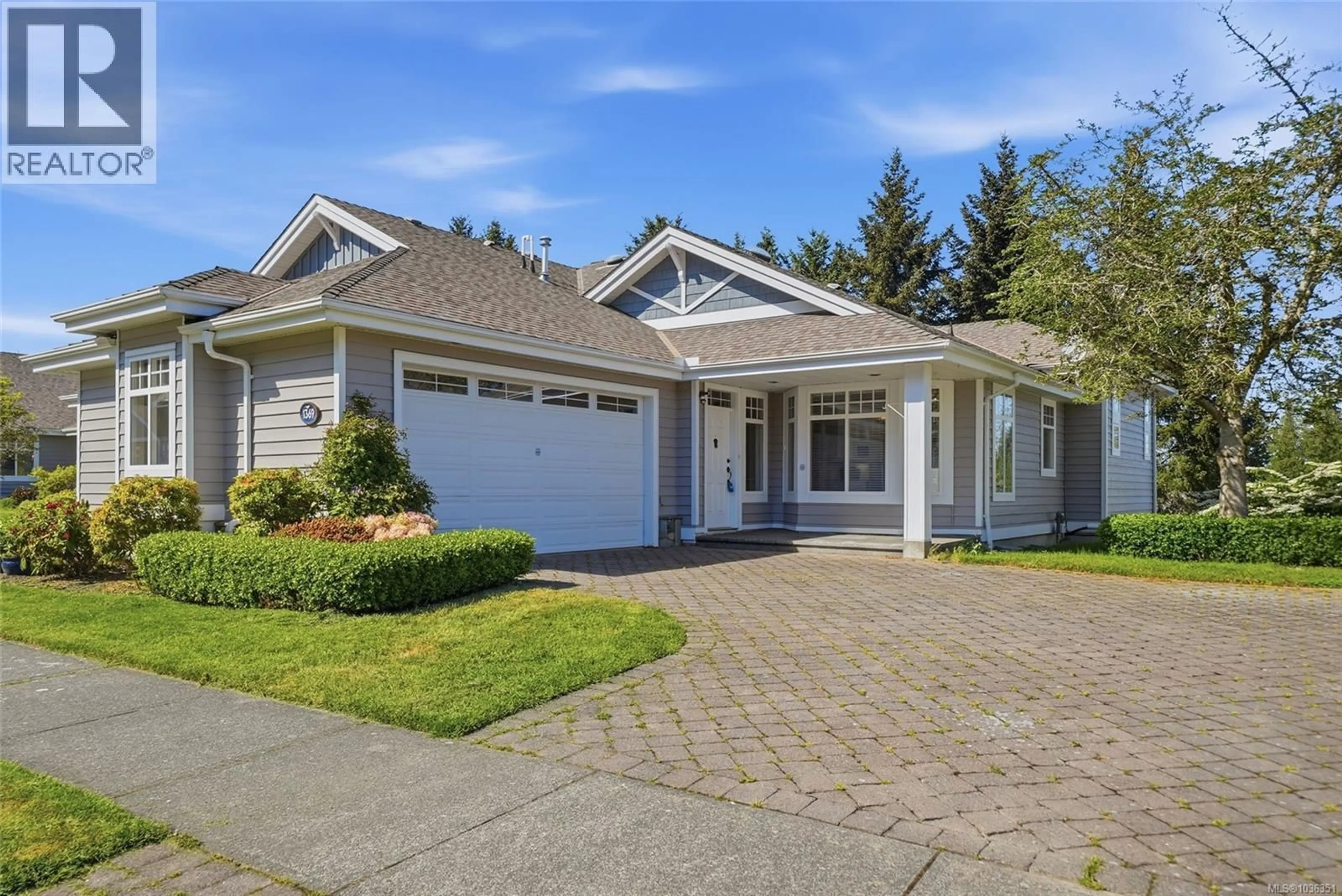 Home with vinyl exterior material, street for 1369 GABRIOLA DRIVE, Parksville British Columbia V9P2X8