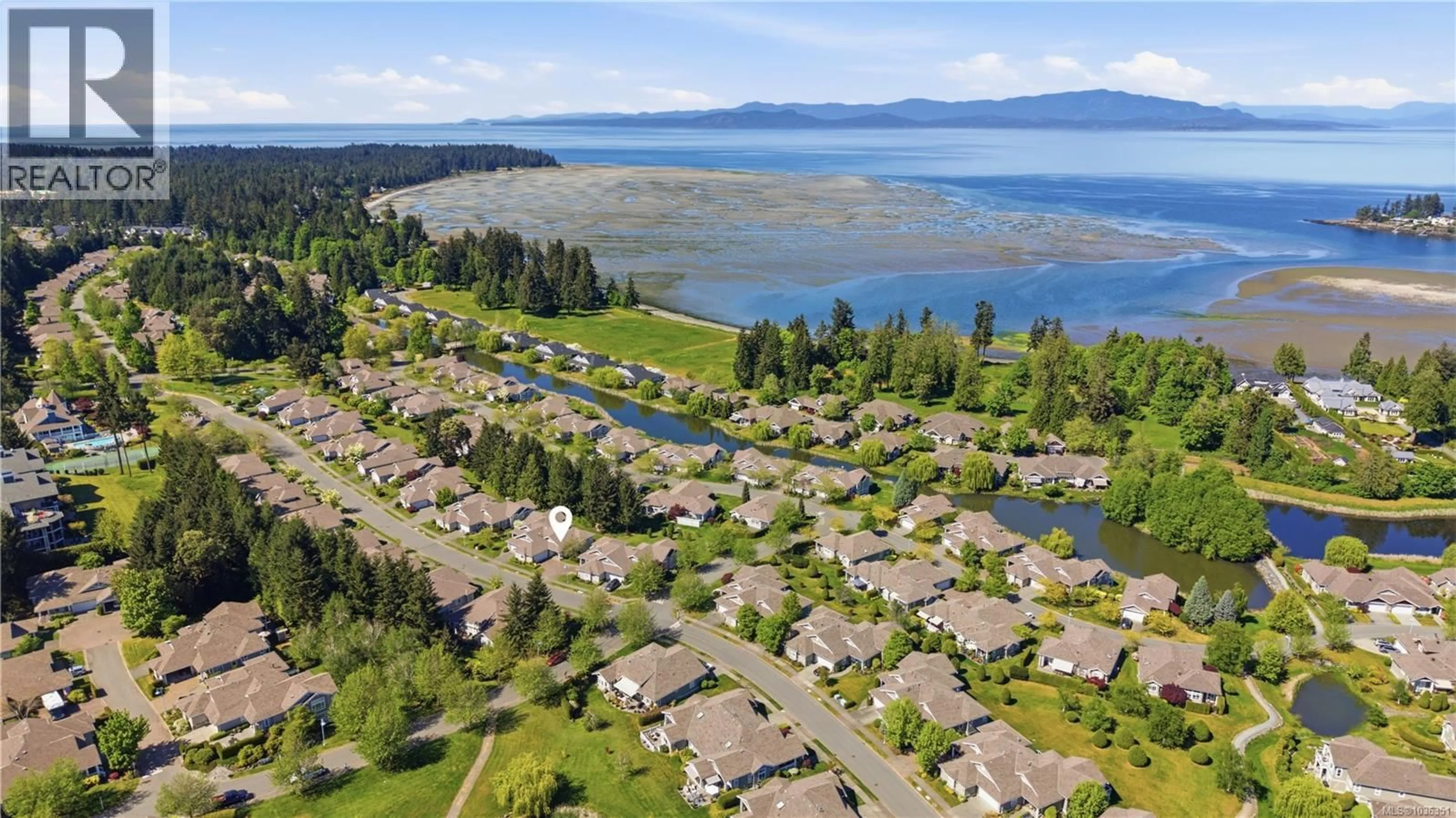 A pic from outside/outdoor area/front of a property/back of a property/a pic from drone, water/lake/river/ocean view for 1369 GABRIOLA DRIVE, Parksville British Columbia V9P2X8