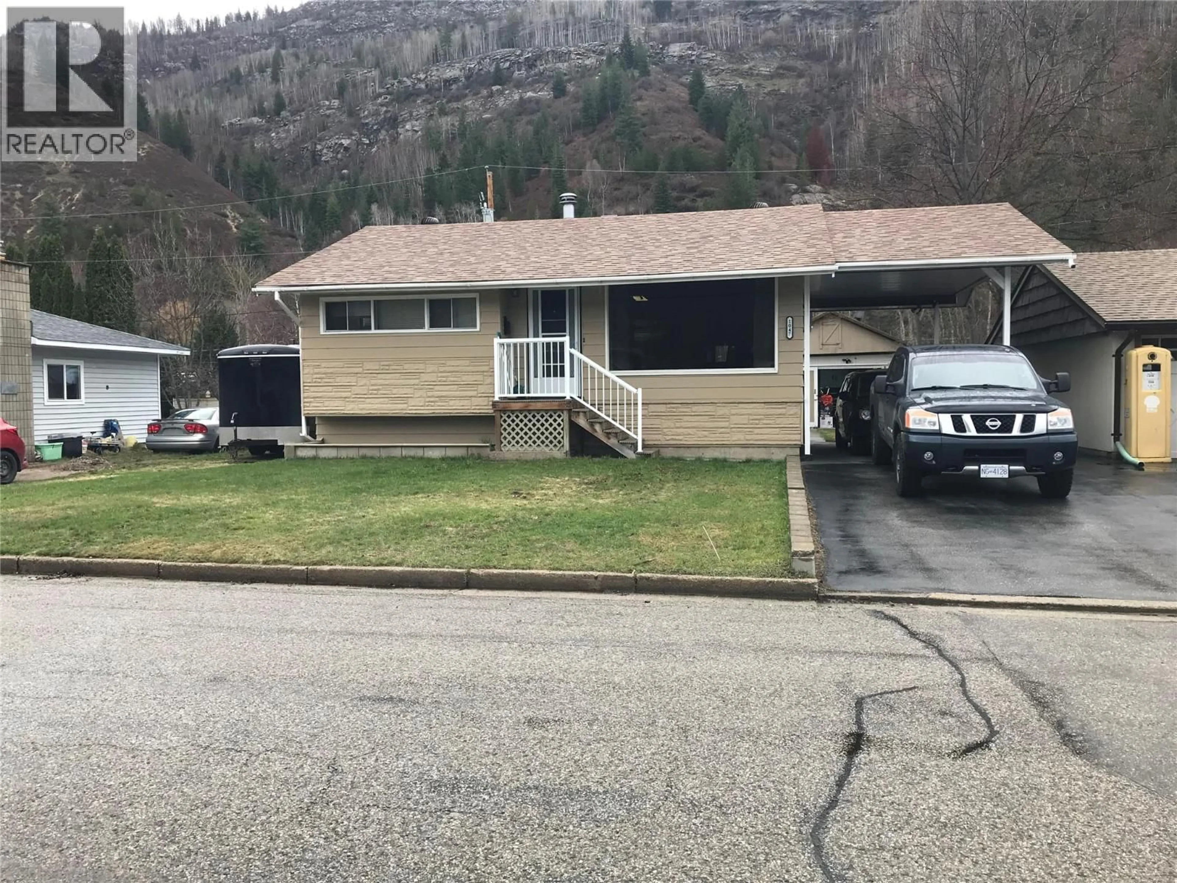 Home with vinyl exterior material, mountain view for 1047 REGAN CRESCENT, Trail British Columbia V1R1C3