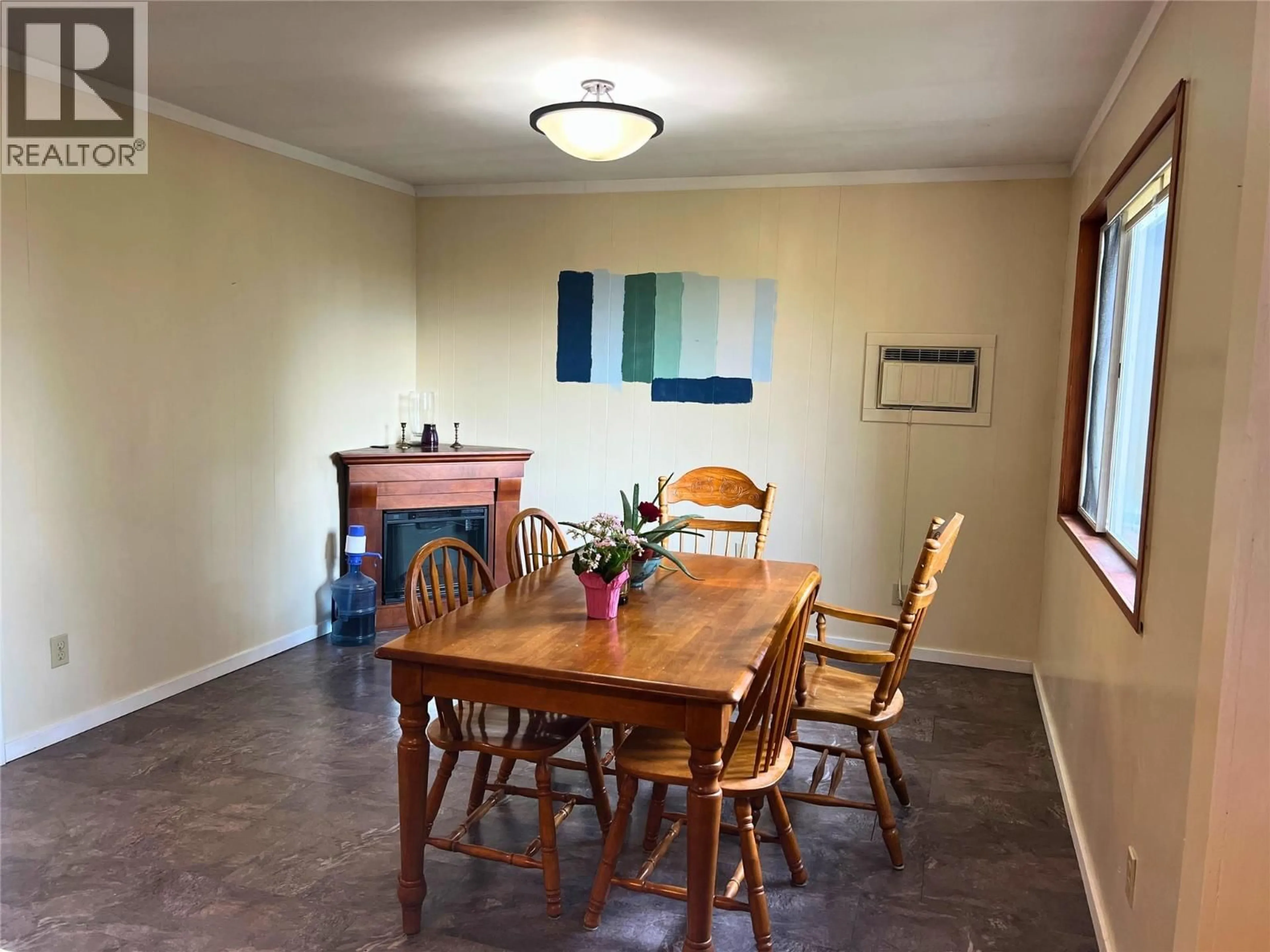 Dining room, wood/laminate floor for 7508 CROWFOOT DRIVE, Anglemont British Columbia V0E1M8