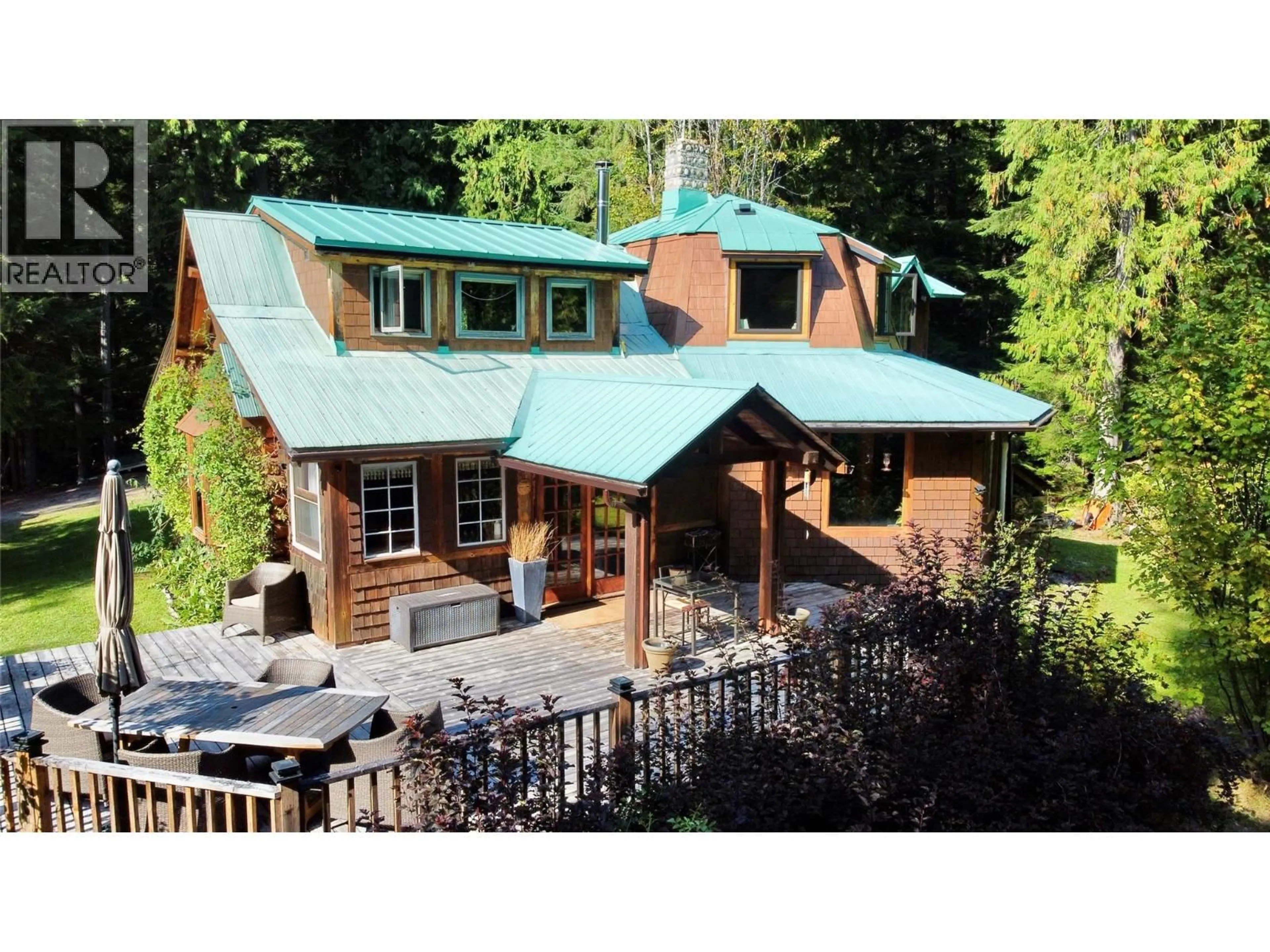 A pic from outside/outdoor area/front of a property/back of a property/a pic from drone, unknown for 785 BEECH ROAD, Nakusp British Columbia V0G1R1
