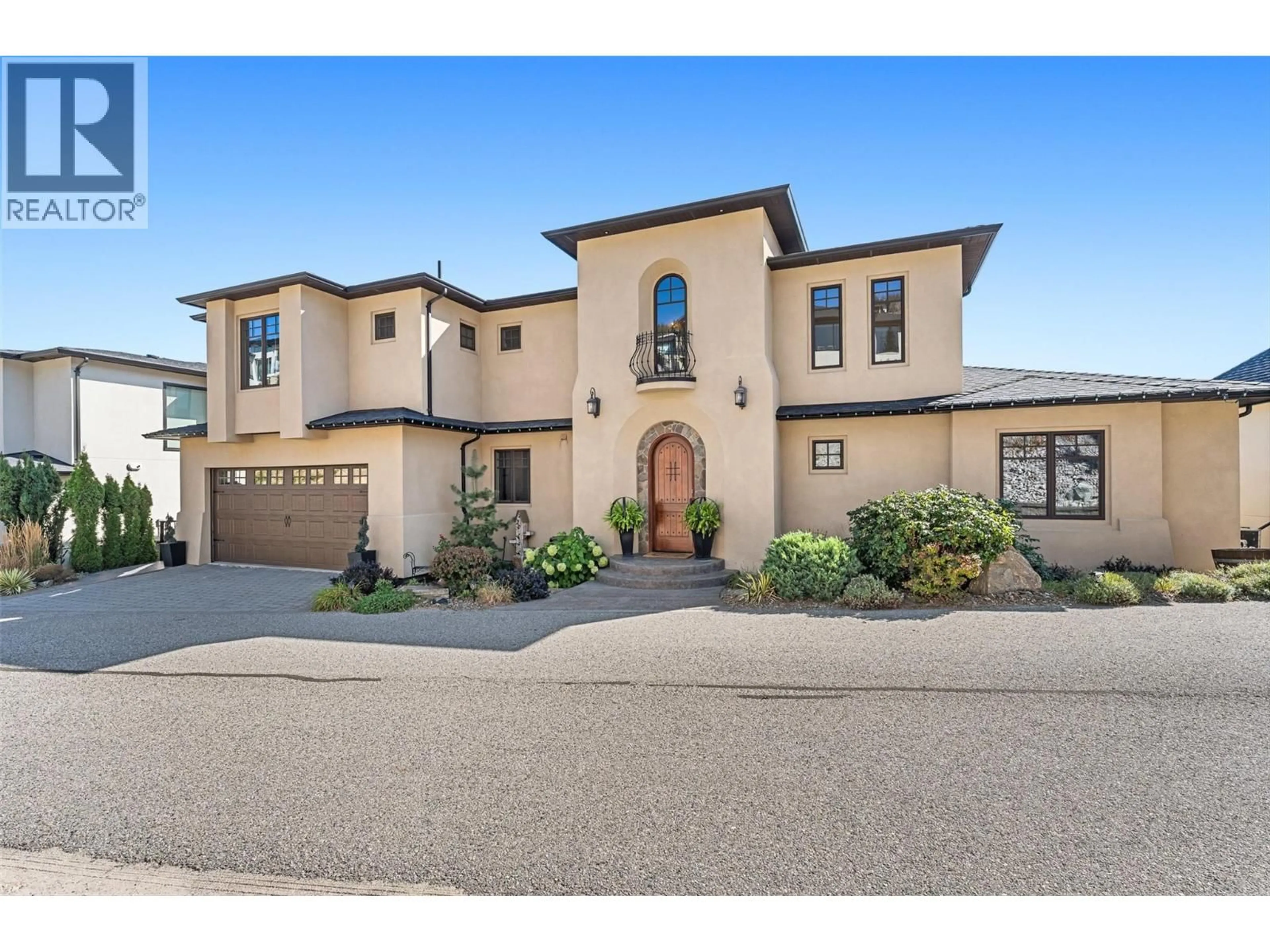 Home with brick exterior material, street for 3211 PINOT NOIR PLACE, West Kelowna British Columbia V4T3H9