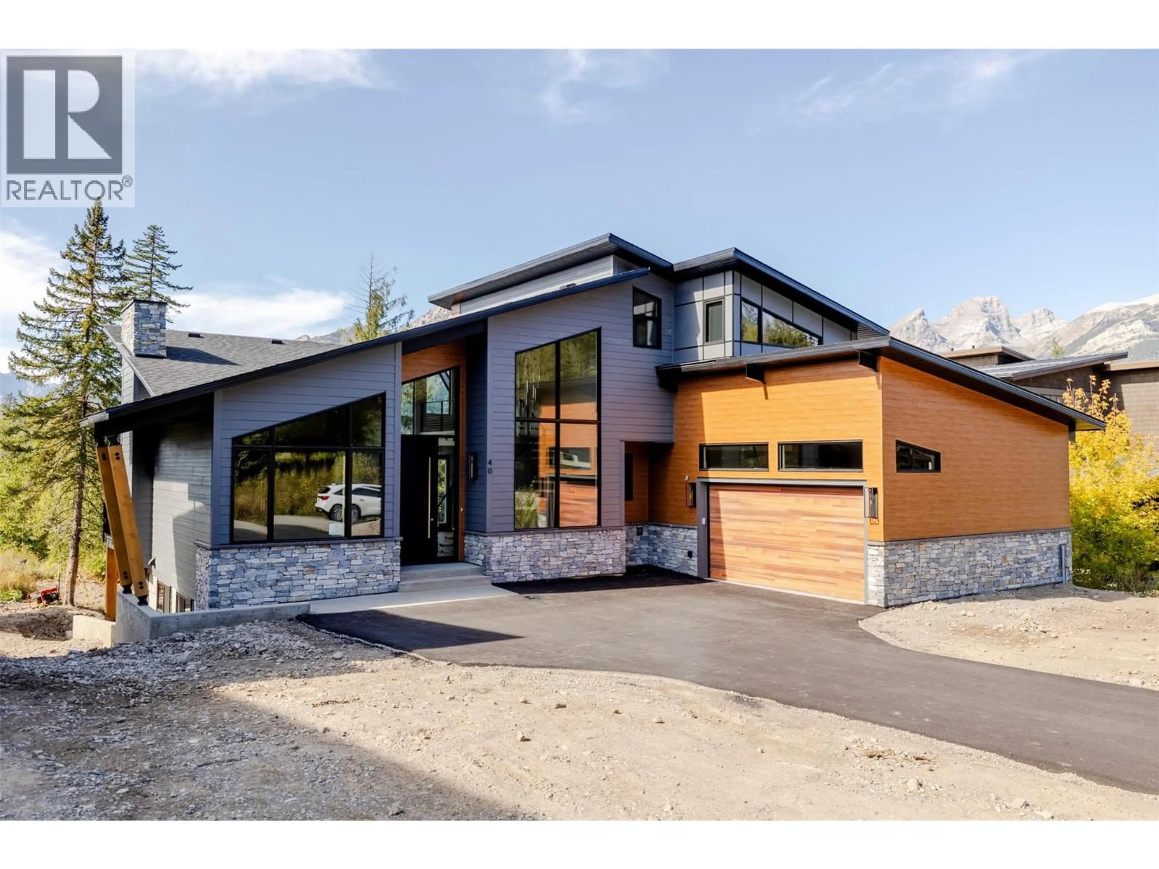 Home with brick exterior material, street for 40 PIEDMONT DRIVE, Fernie British Columbia V0B1M4