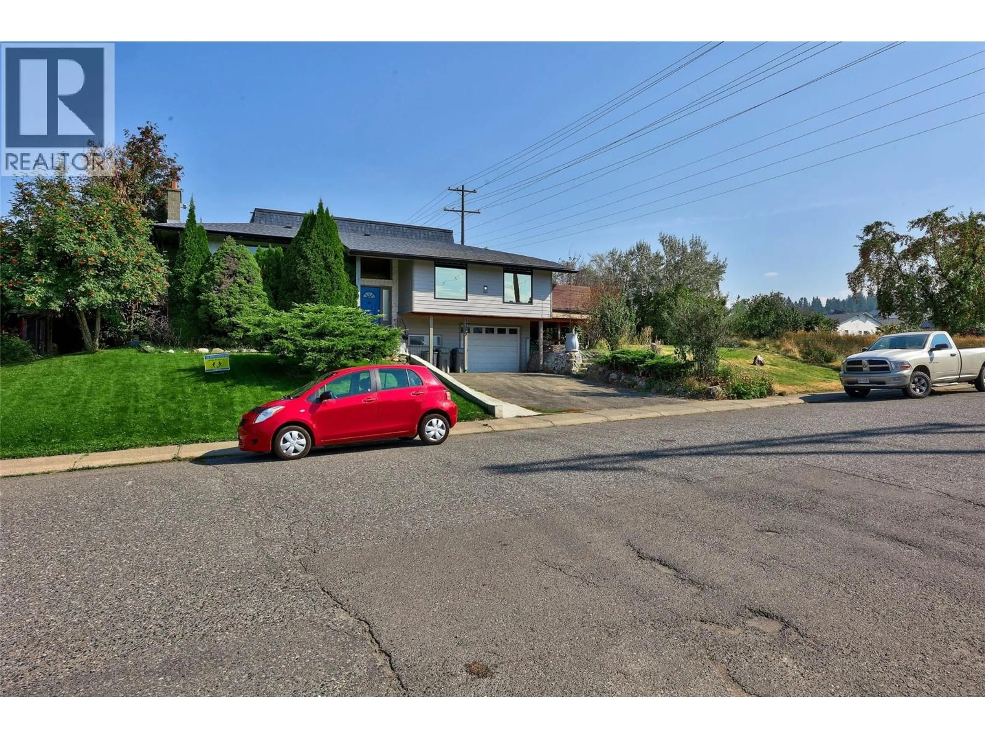 A pic from outside/outdoor area/front of a property/back of a property/a pic from drone, street for 1757 SPRINGVIEW PLACE, Kamloops British Columbia V2E1E3