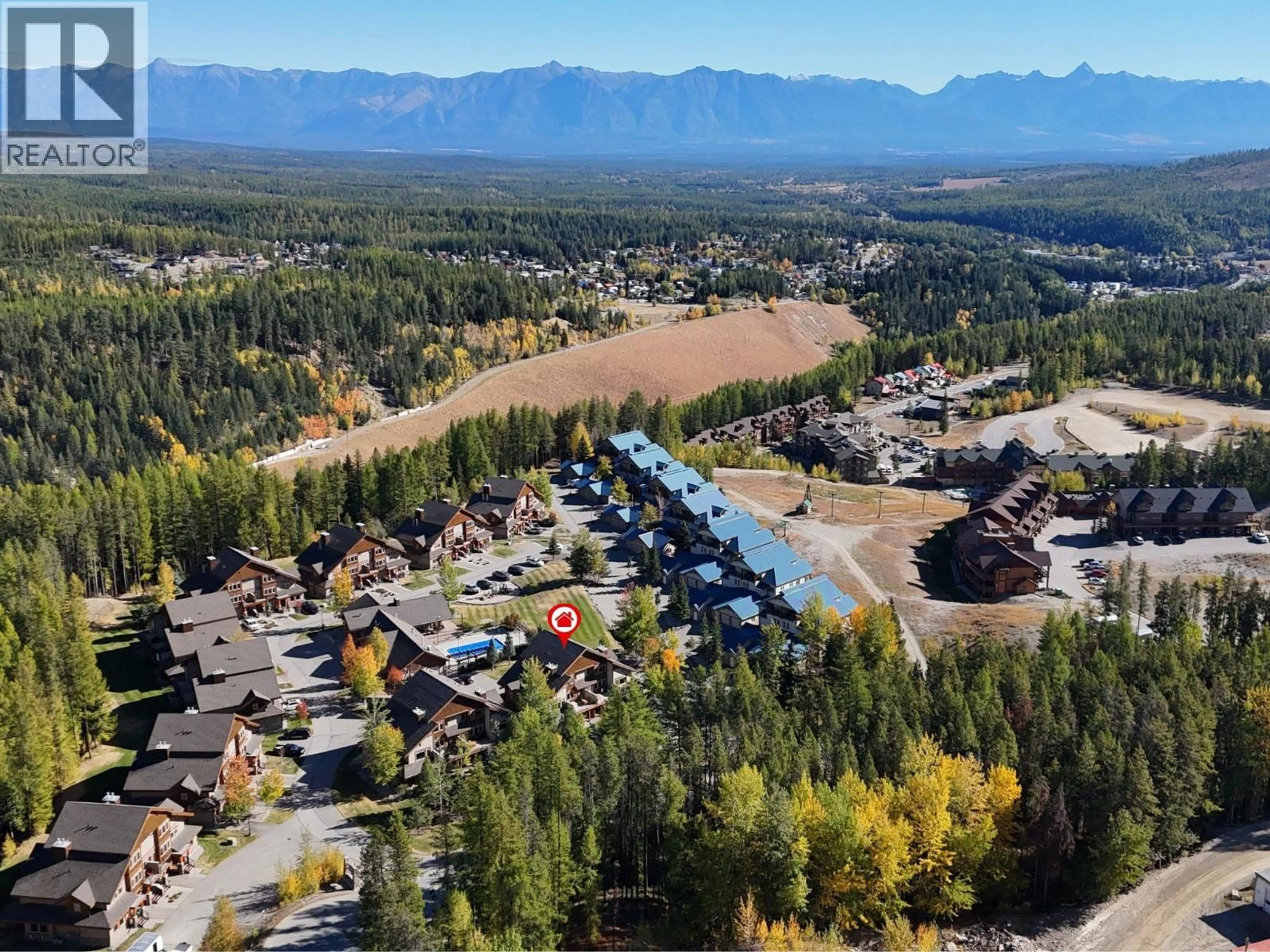 A pic from outside/outdoor area/front of a property/back of a property/a pic from drone, mountain view for N1-A - 1351 GERRY SORENSEN WAY, Kimberley British Columbia V1A2Y9