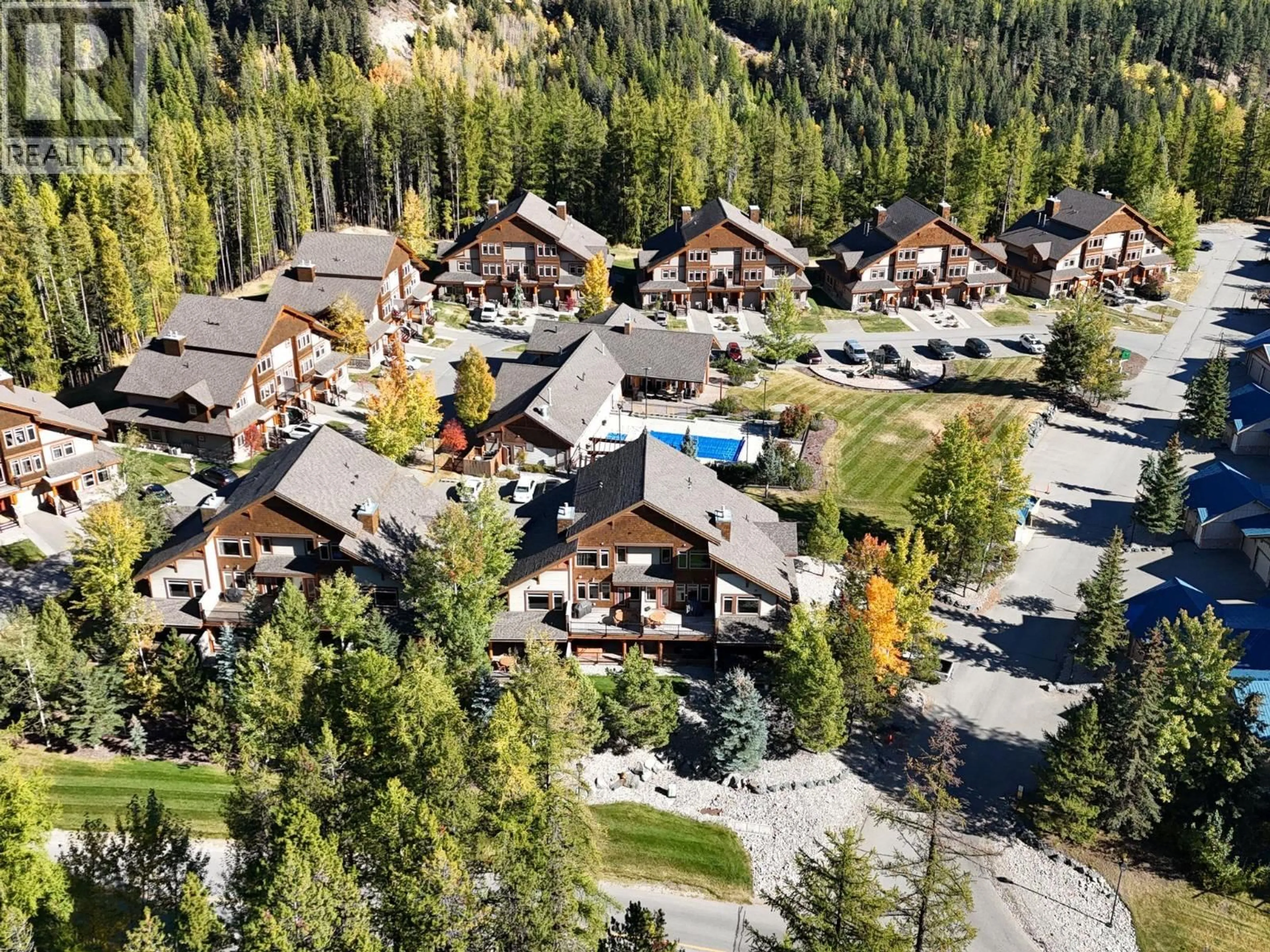 A pic from outside/outdoor area/front of a property/back of a property/a pic from drone, mountain view for N1-A - 1351 GERRY SORENSEN WAY, Kimberley British Columbia V1A2Y9