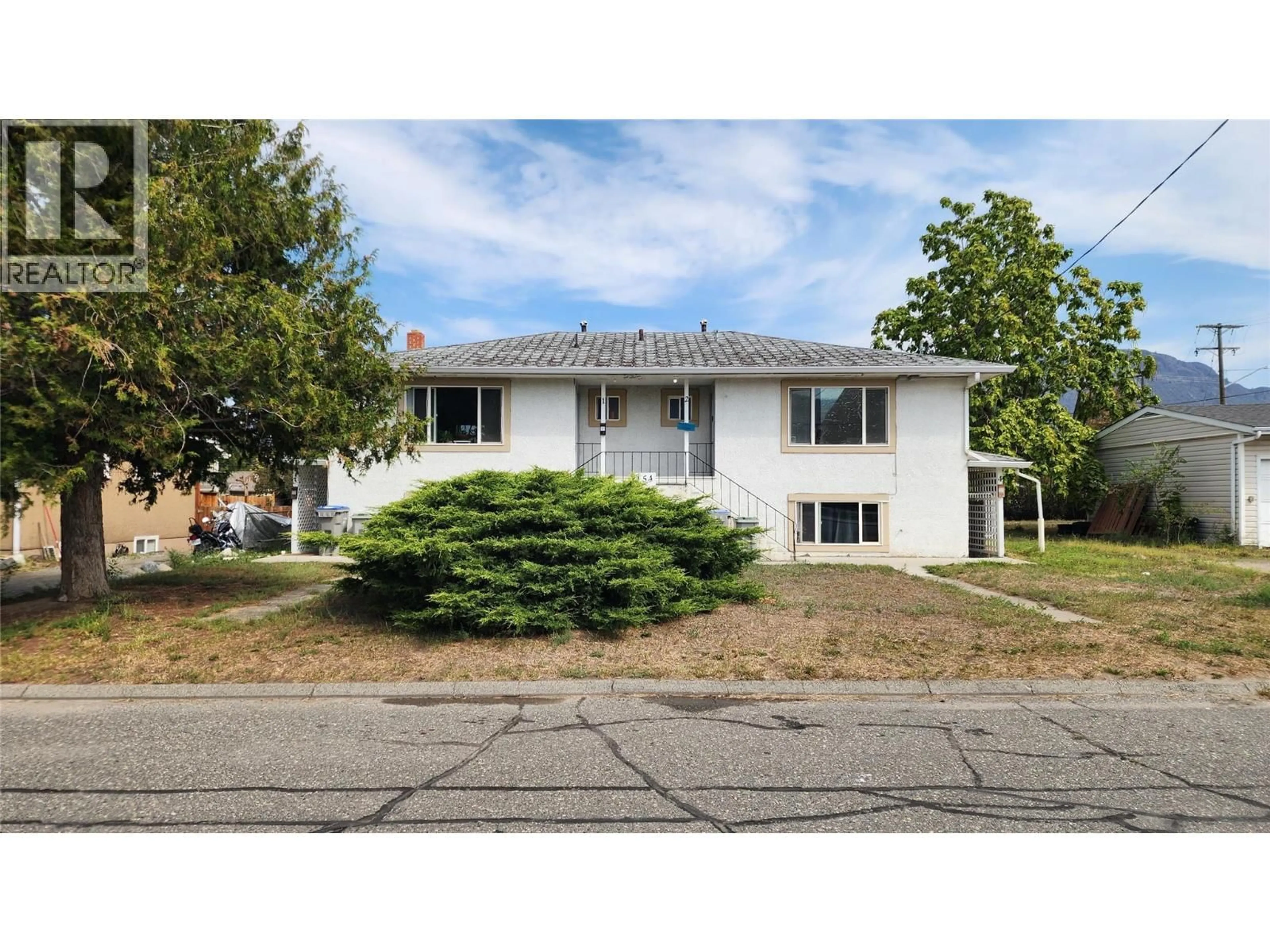 Home with vinyl exterior material, street for 454 LINDEN AVENUE, Kamloops British Columbia V2B2N3