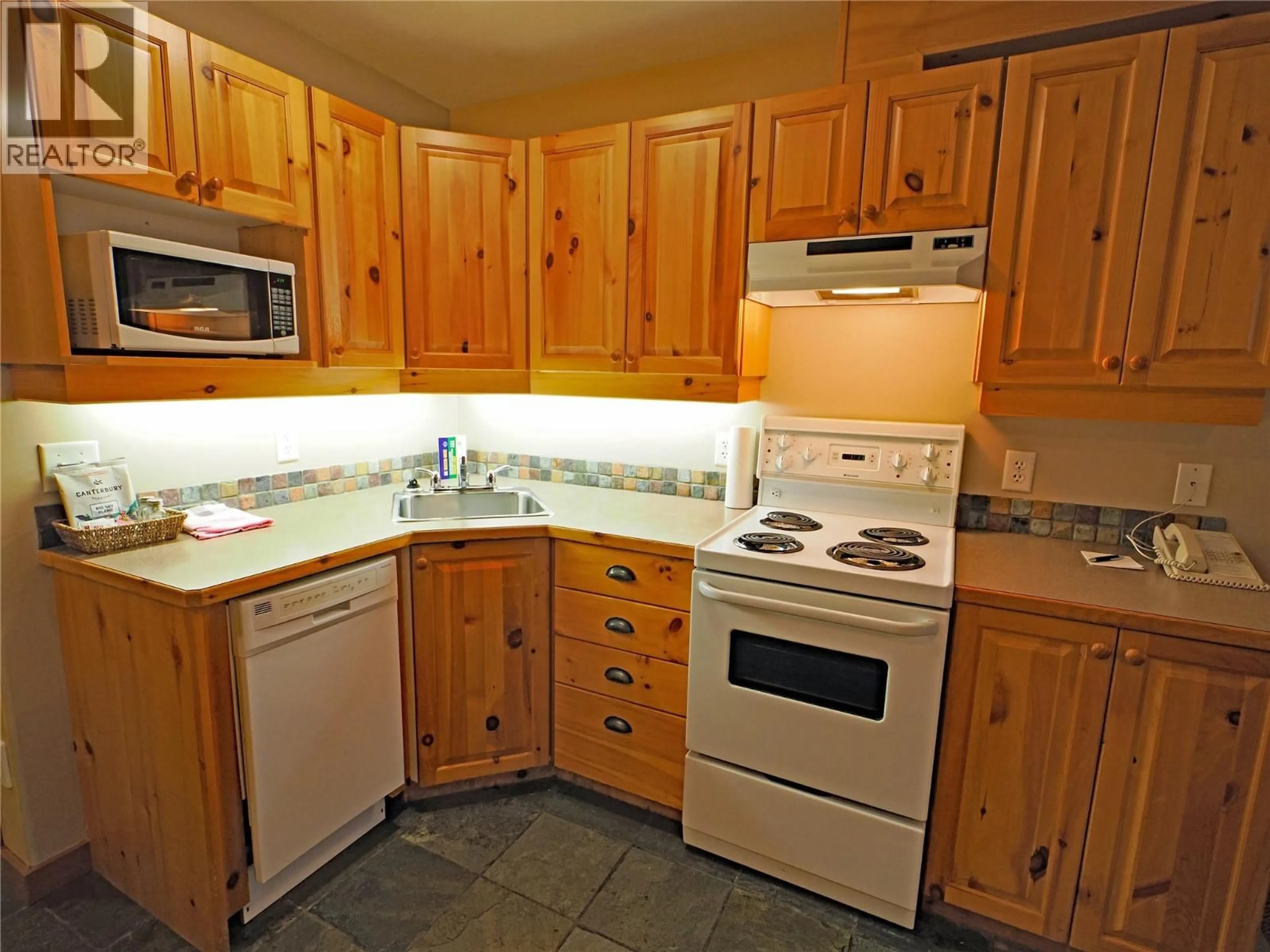 Standard kitchen, unknown for 303/305 - 5335 BIG WHITE ROAD, Big White British Columbia V1P1P3