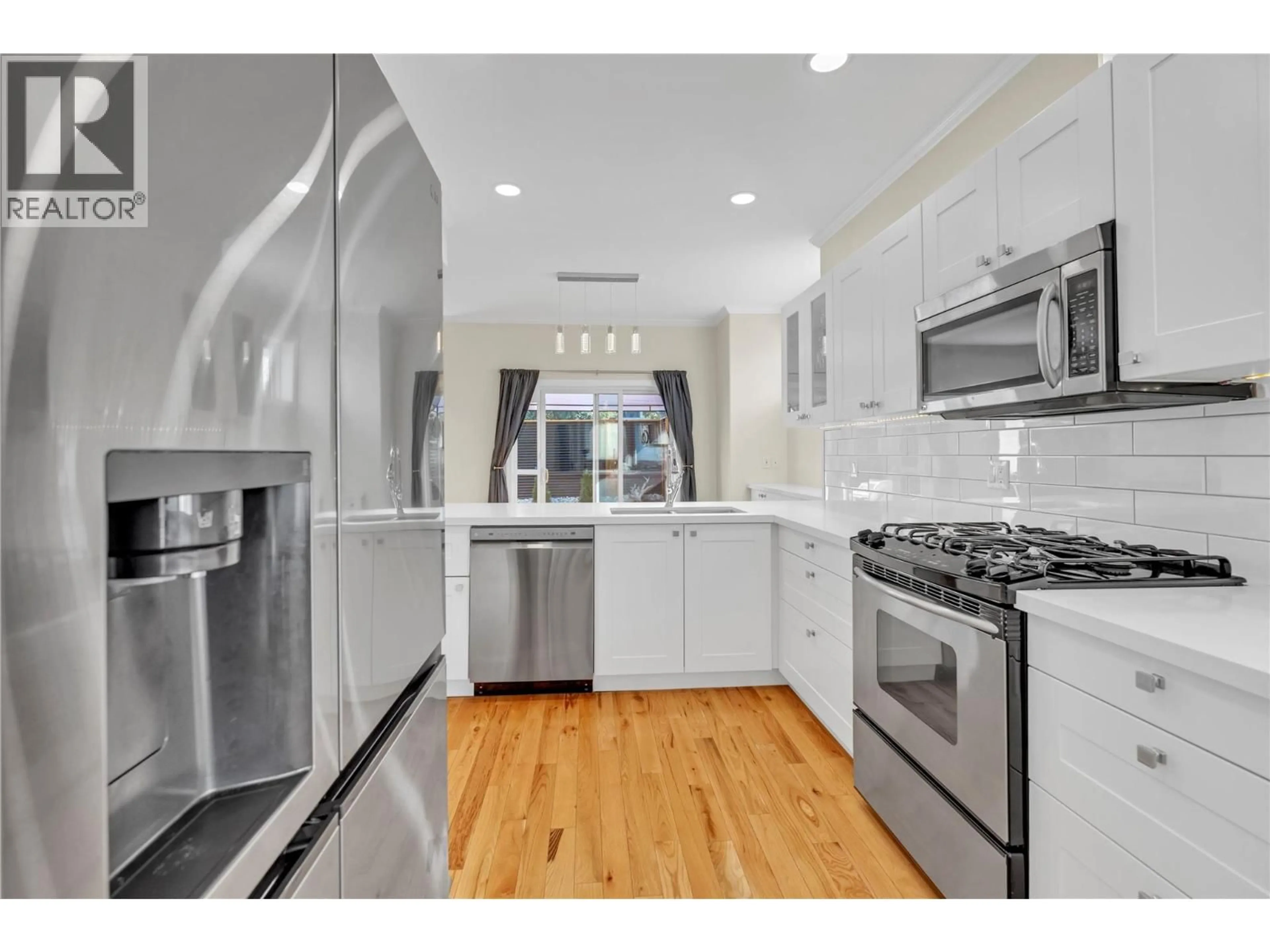 Open concept kitchen, ceramic/tile floor for 7 - 148 ROY AVENUE, Penticton British Columbia V2A3M9