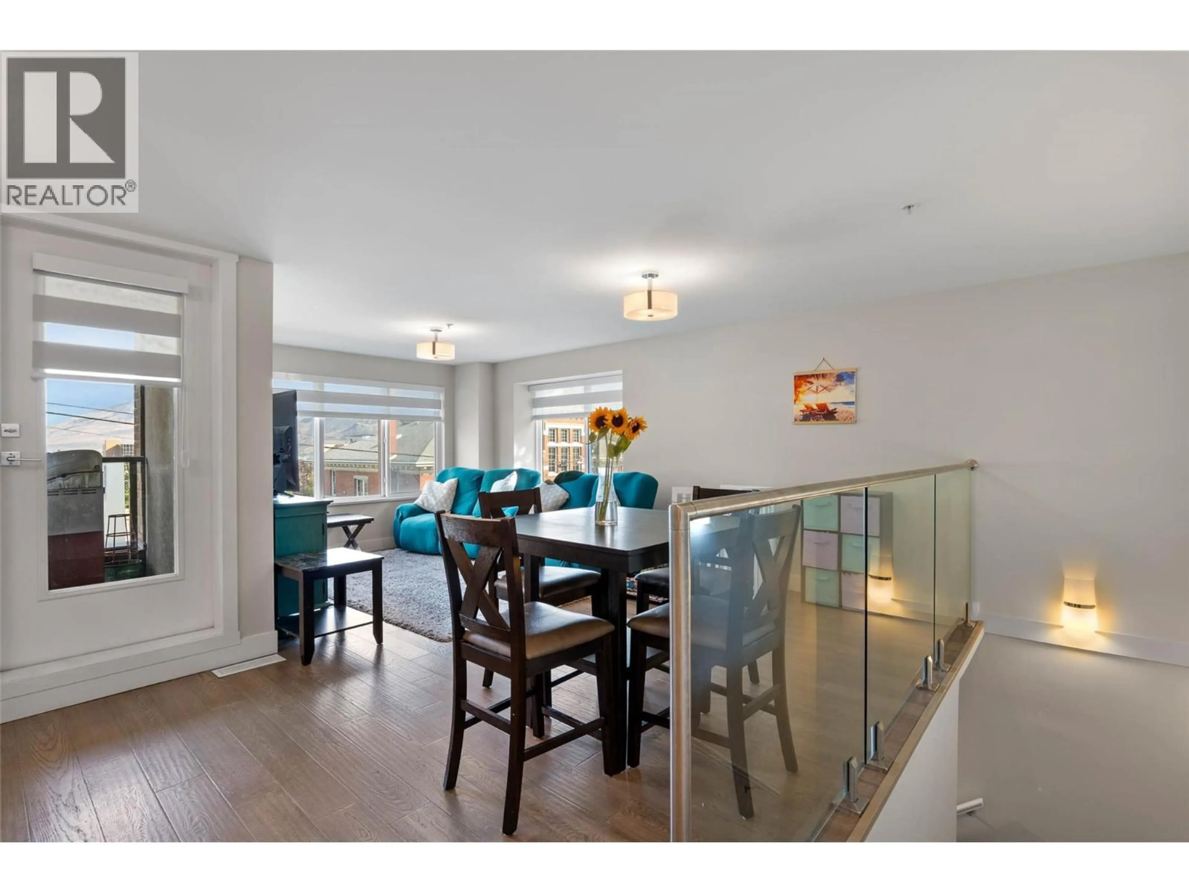 Dining room, wood/laminate floor for 104 - 227 BATTLE STREET, Kamloops British Columbia V2C2L3