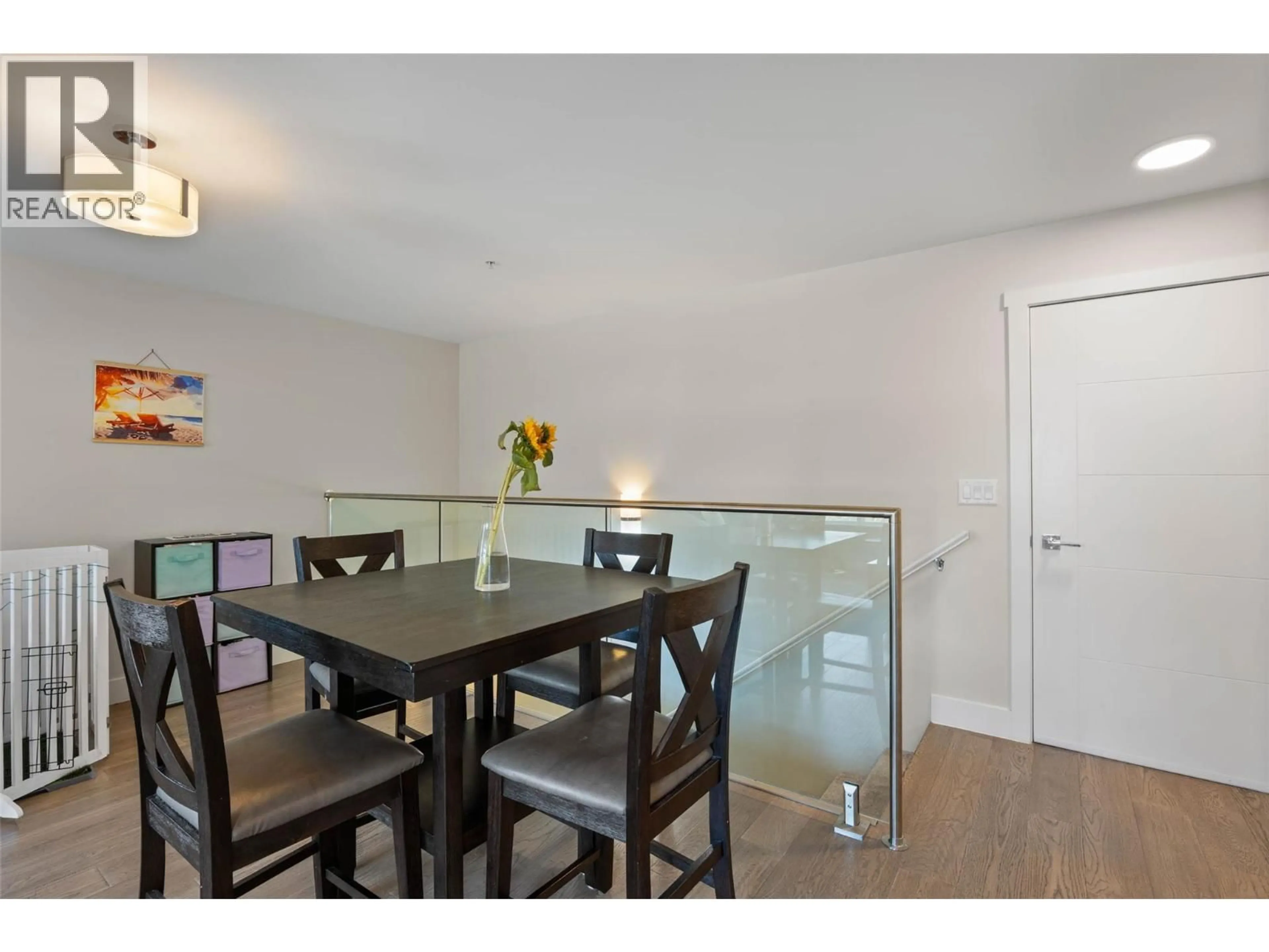 Dining room, wood/laminate floor for 104 - 227 BATTLE STREET, Kamloops British Columbia V2C2L3