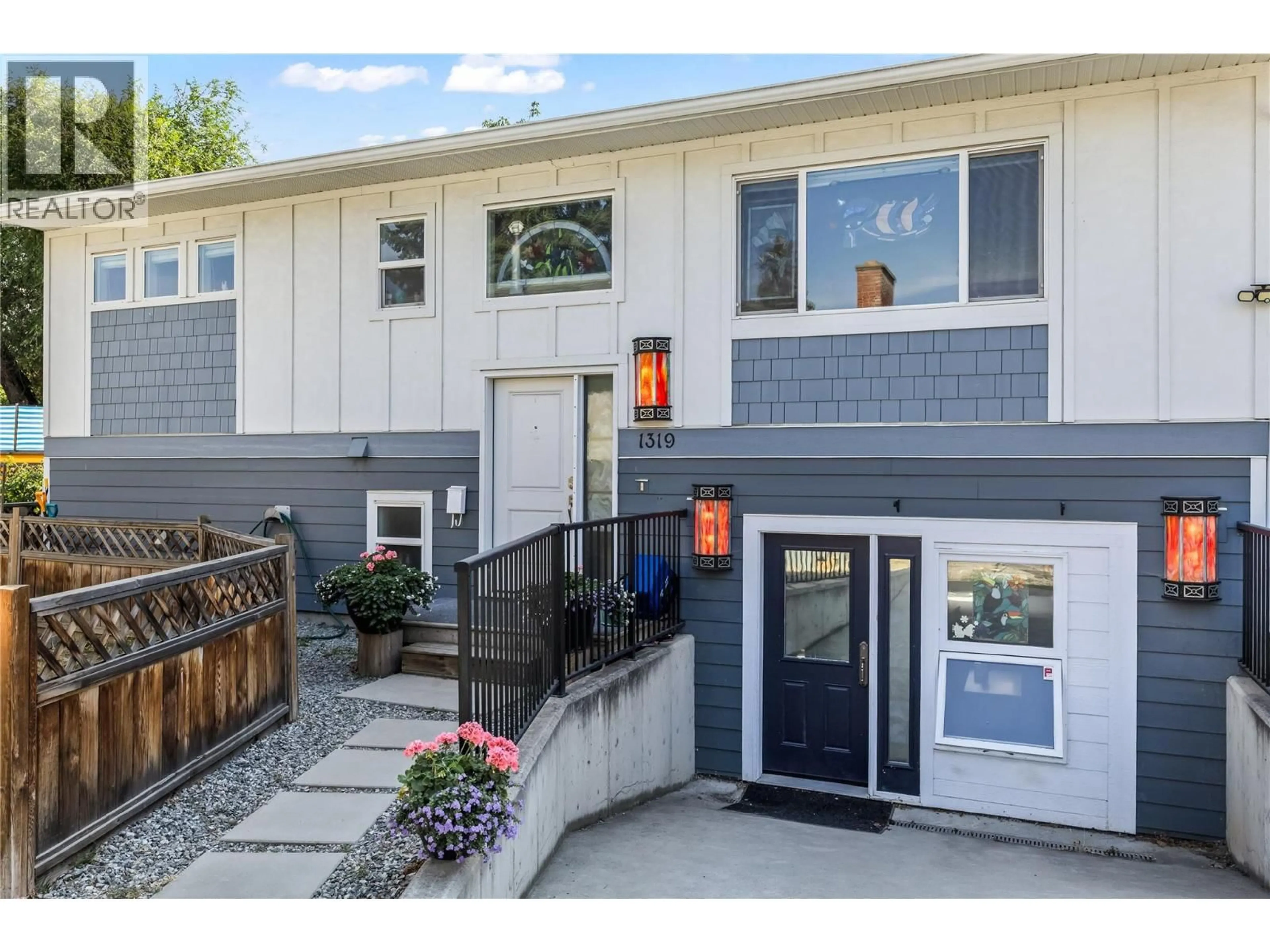 Home with vinyl exterior material, street for 1319 BELAIRE AVENUE, Kelowna British Columbia V1Y6B8