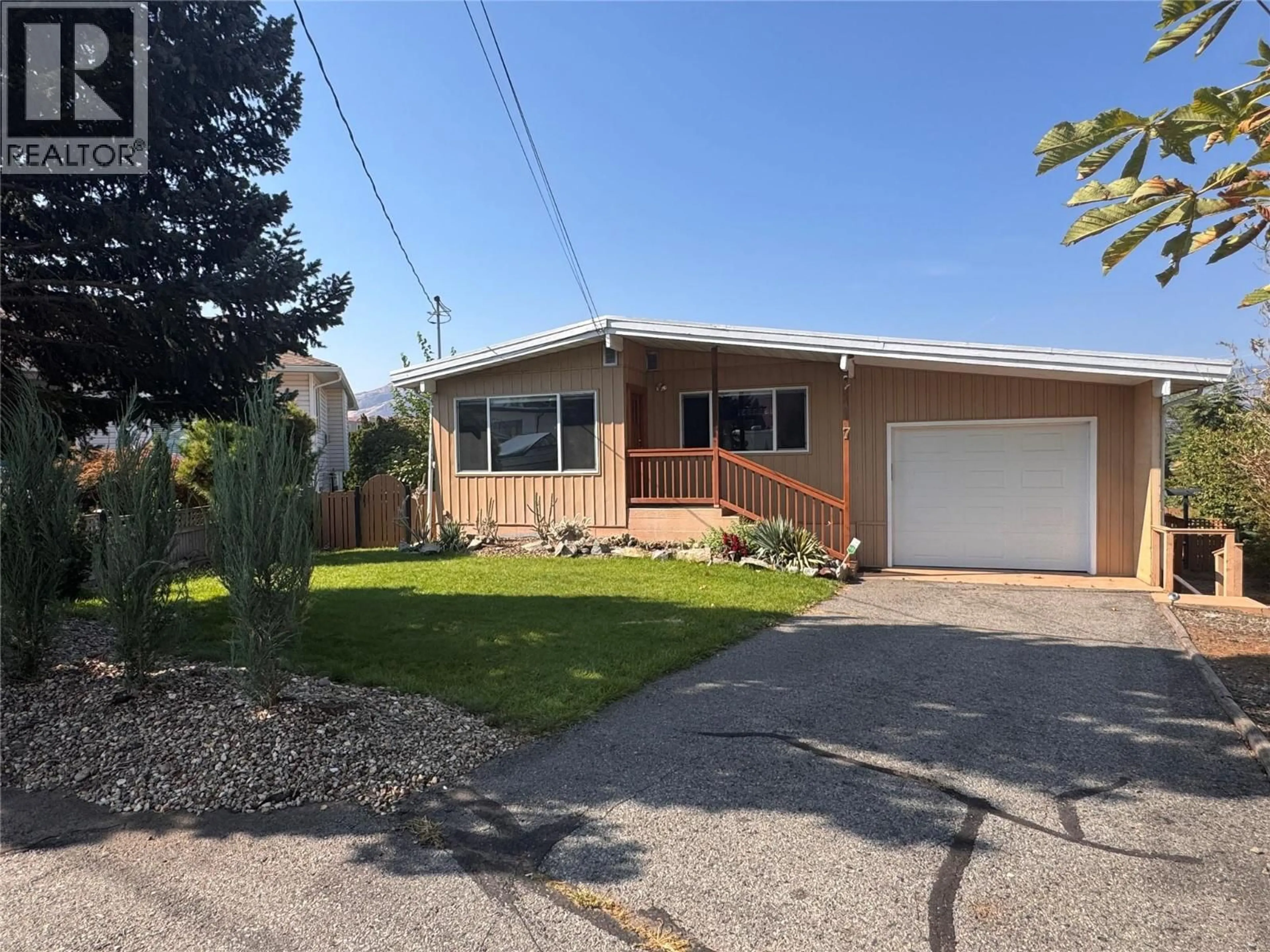 Home with vinyl exterior material, street for 7 BIRCH COURT, Osoyoos British Columbia V0H1V3