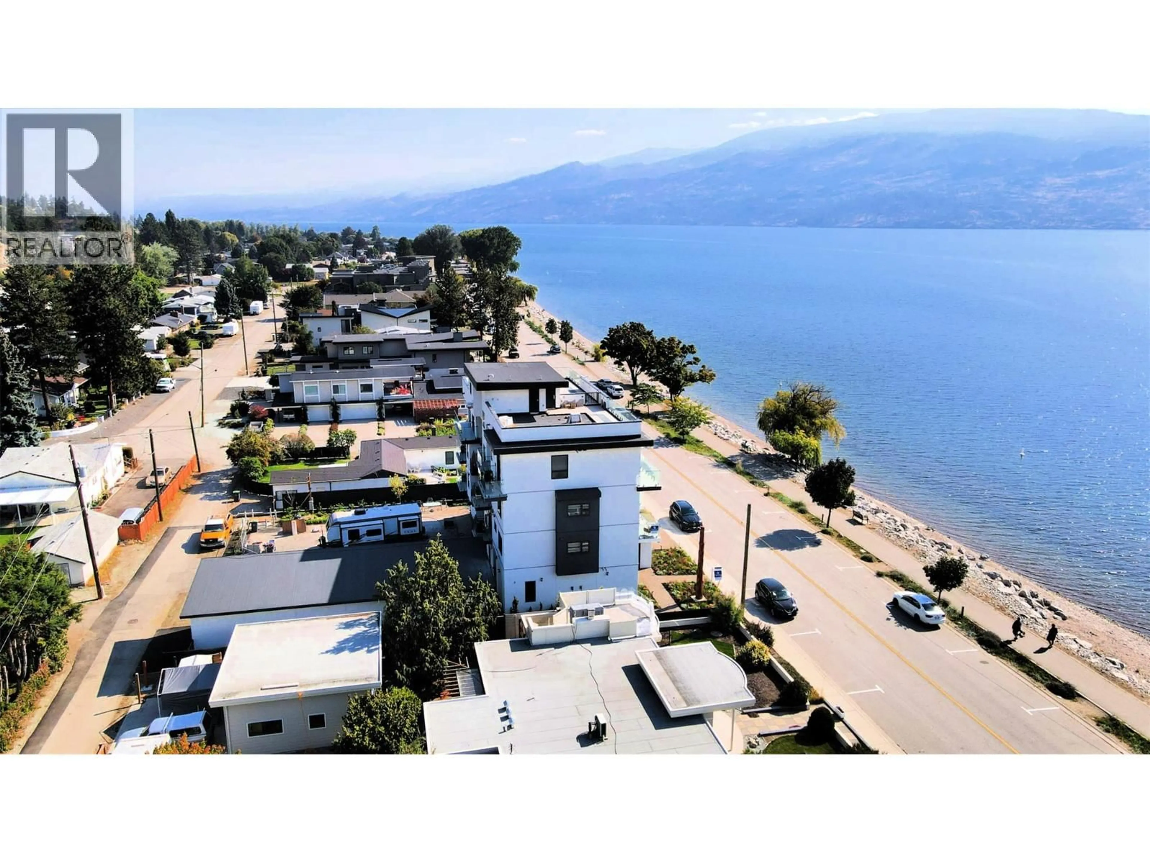 A pic from outside/outdoor area/front of a property/back of a property/a pic from drone, unknown for 102 - 4340A BEACH AVENUE, Peachland British Columbia V0H1X6