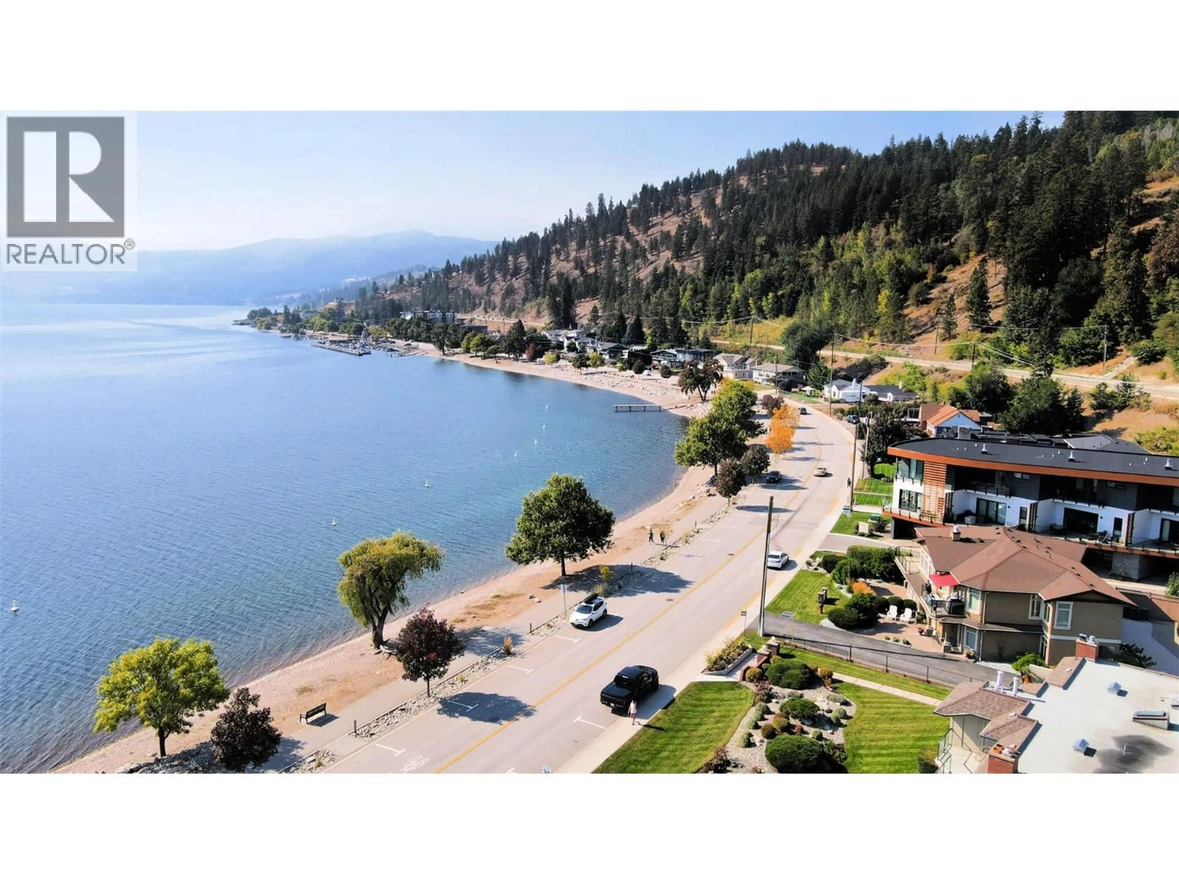 A pic from outside/outdoor area/front of a property/back of a property/a pic from drone, water/lake/river/ocean view for 102 - 4340A BEACH AVENUE, Peachland British Columbia V0H1X6