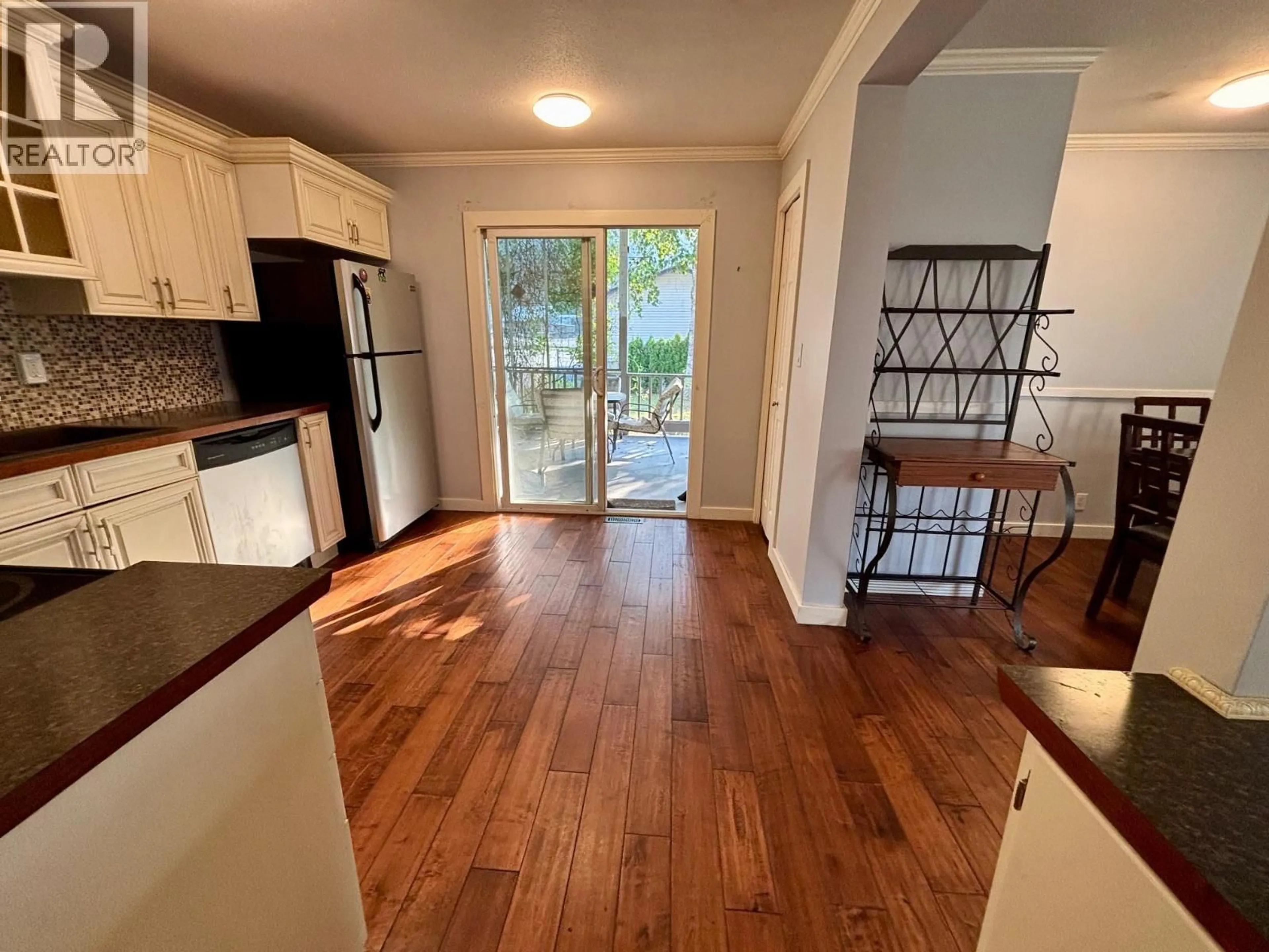 Open concept kitchen, wood/laminate floor for 5 - 241 23 N HIGHWAY, Revelstoke British Columbia V0E2S0