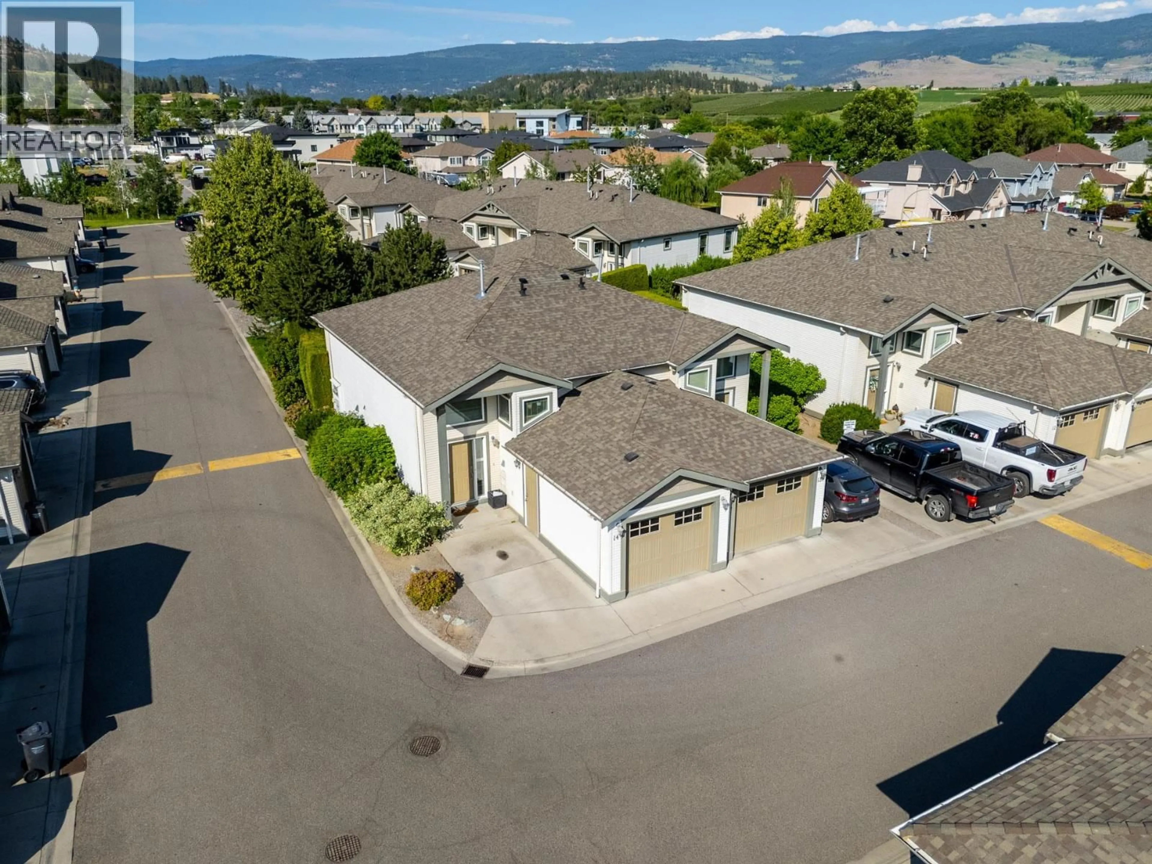 A pic from outside/outdoor area/front of a property/back of a property/a pic from drone, mountain view for 14 - 225 GLEN PARK DRIVE, Kelowna British Columbia V1V2X5