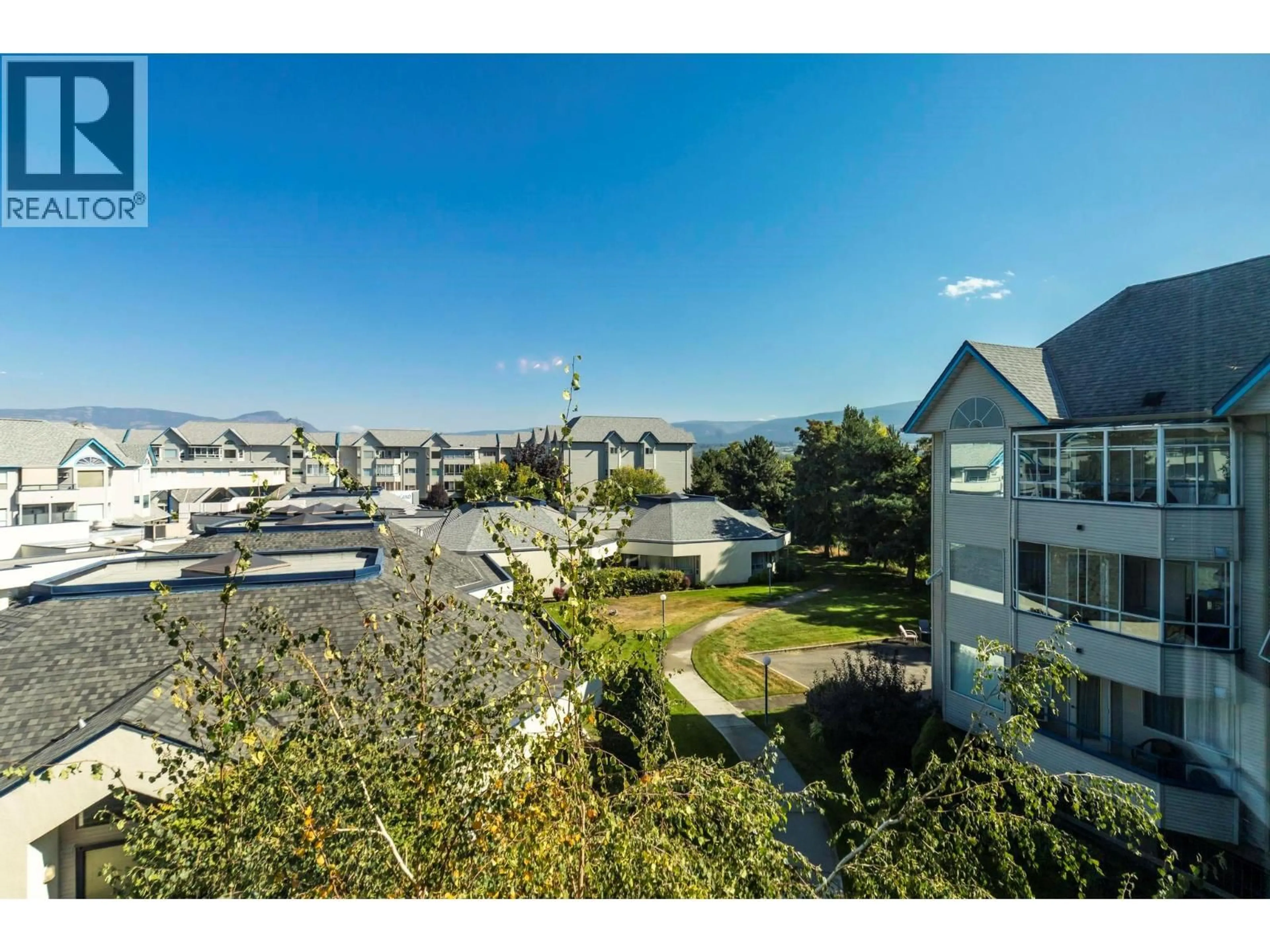 A pic from outside/outdoor area/front of a property/back of a property/a pic from drone, city buildings view from balcony for 308 - 3283 CASORSO ROAD, Kelowna British Columbia V1W3L6